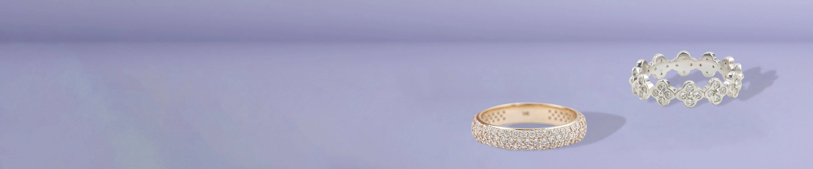 Sparkling pavé gold ring and sculpted silver floral band with diamonds