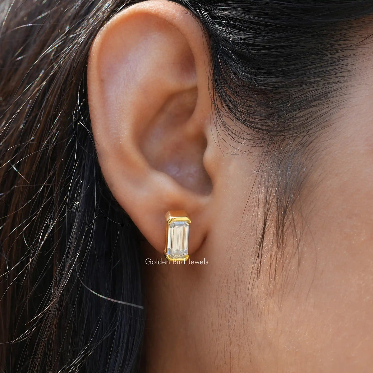 [In ear front view of emerald cut stud earrings]-[Golden Bird Jewels]