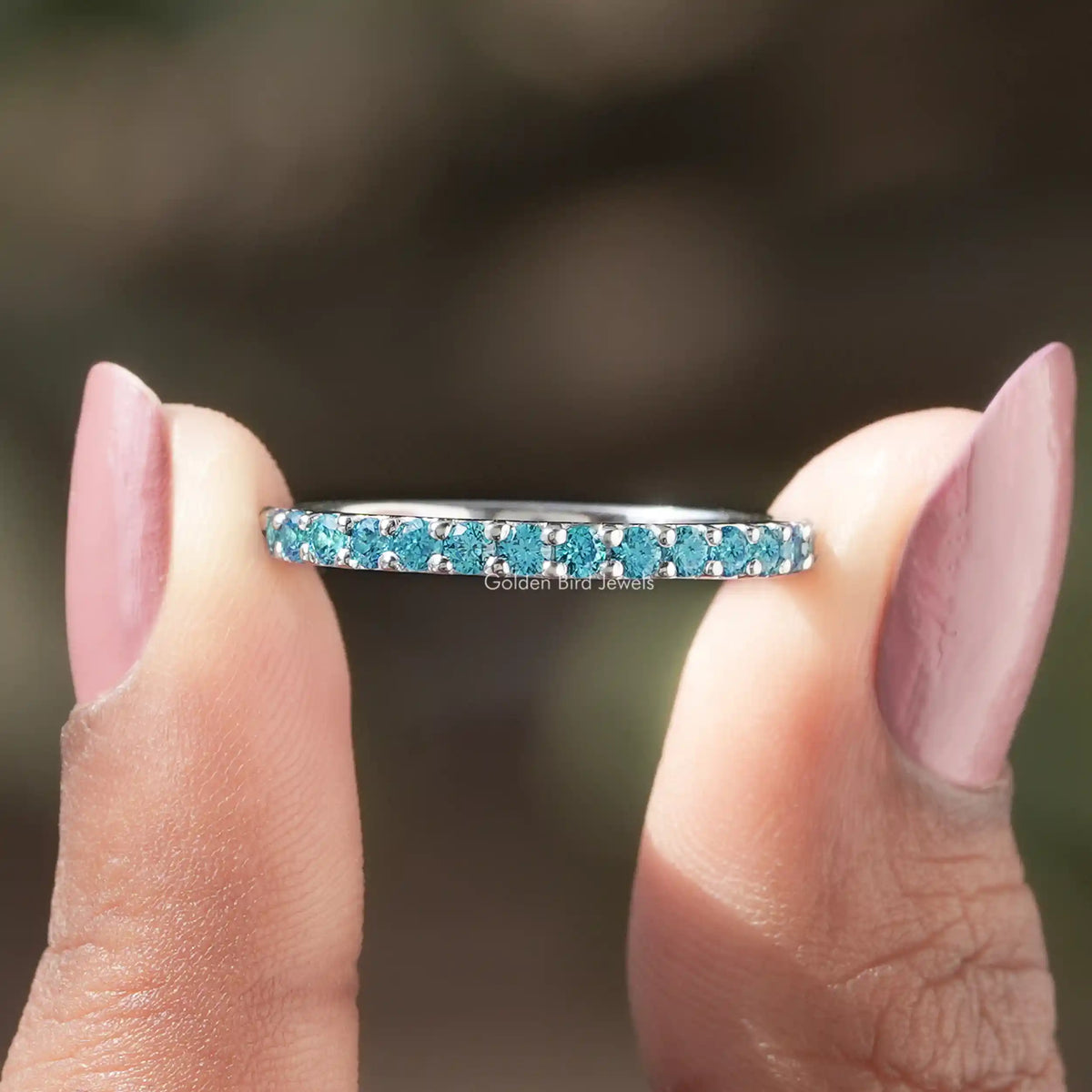 Front view of Aquamarine Blue Round Gemstone Eternity Band
