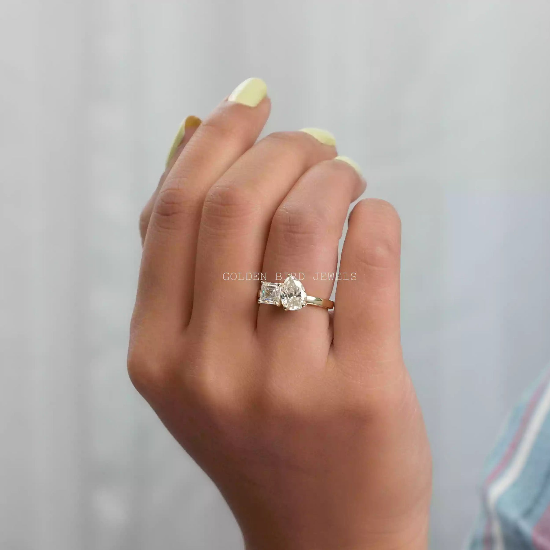 In finger view of multi shape moissanite ring