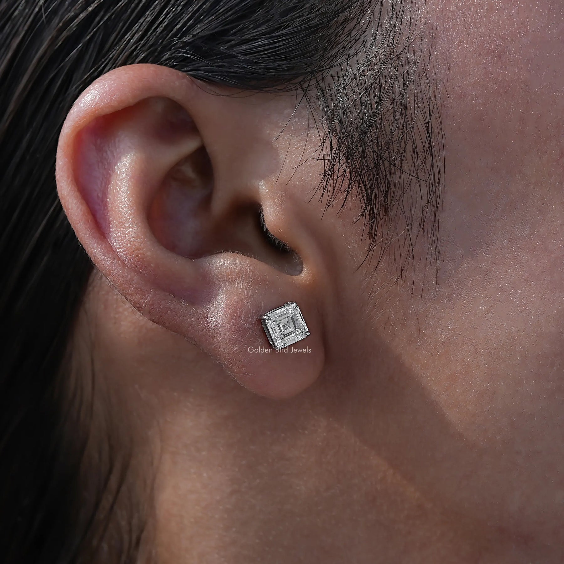 Colorless Asscher cut diamond solitaire stud earrings