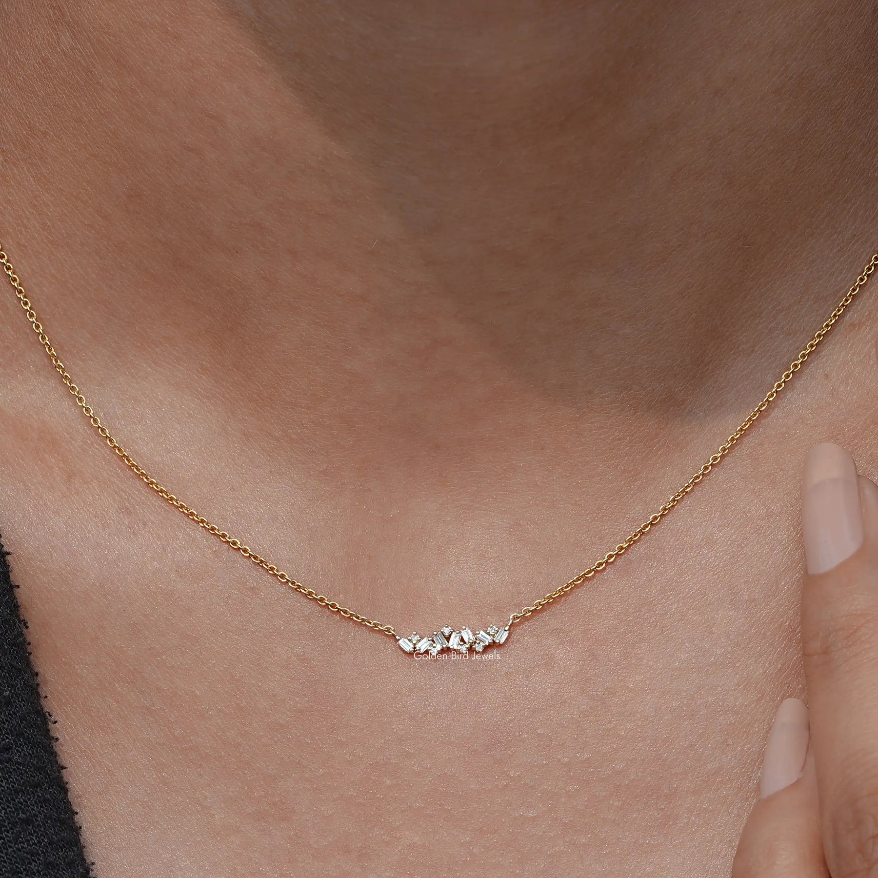 Close-Up View of Baguette Diamond Shaped Cluster Pendant In Yellow Gold
