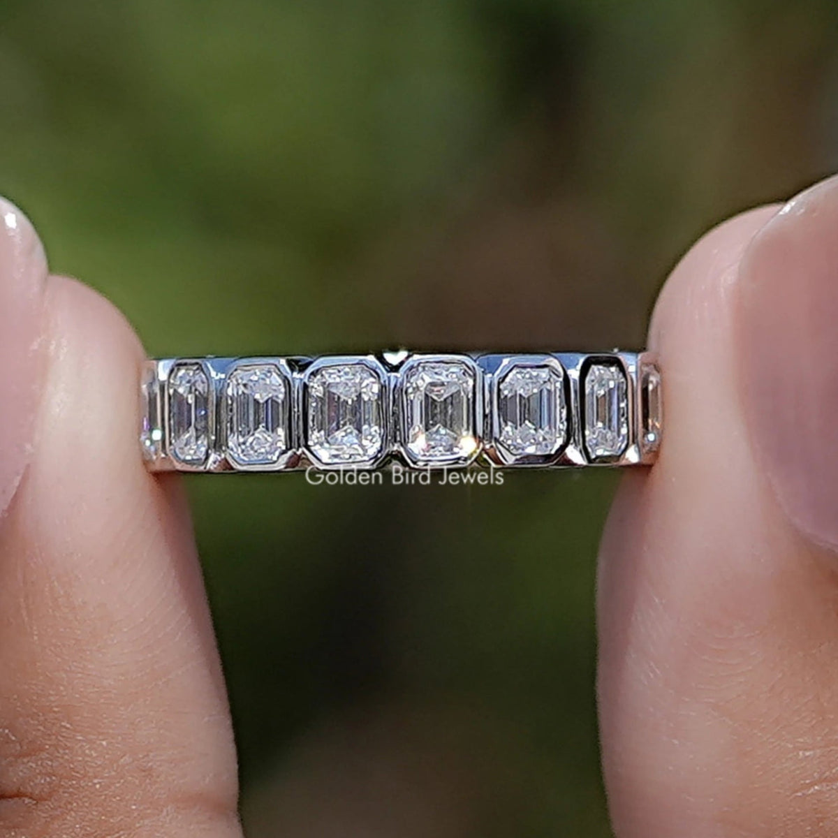 Front view of Bezel Set Emerald Cut Full Eternity Band