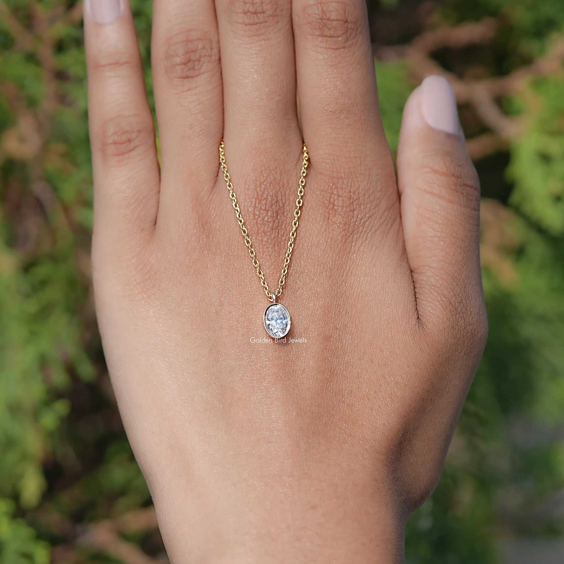 Close View Of Oval Cut solitaire pendant in Secure Setting