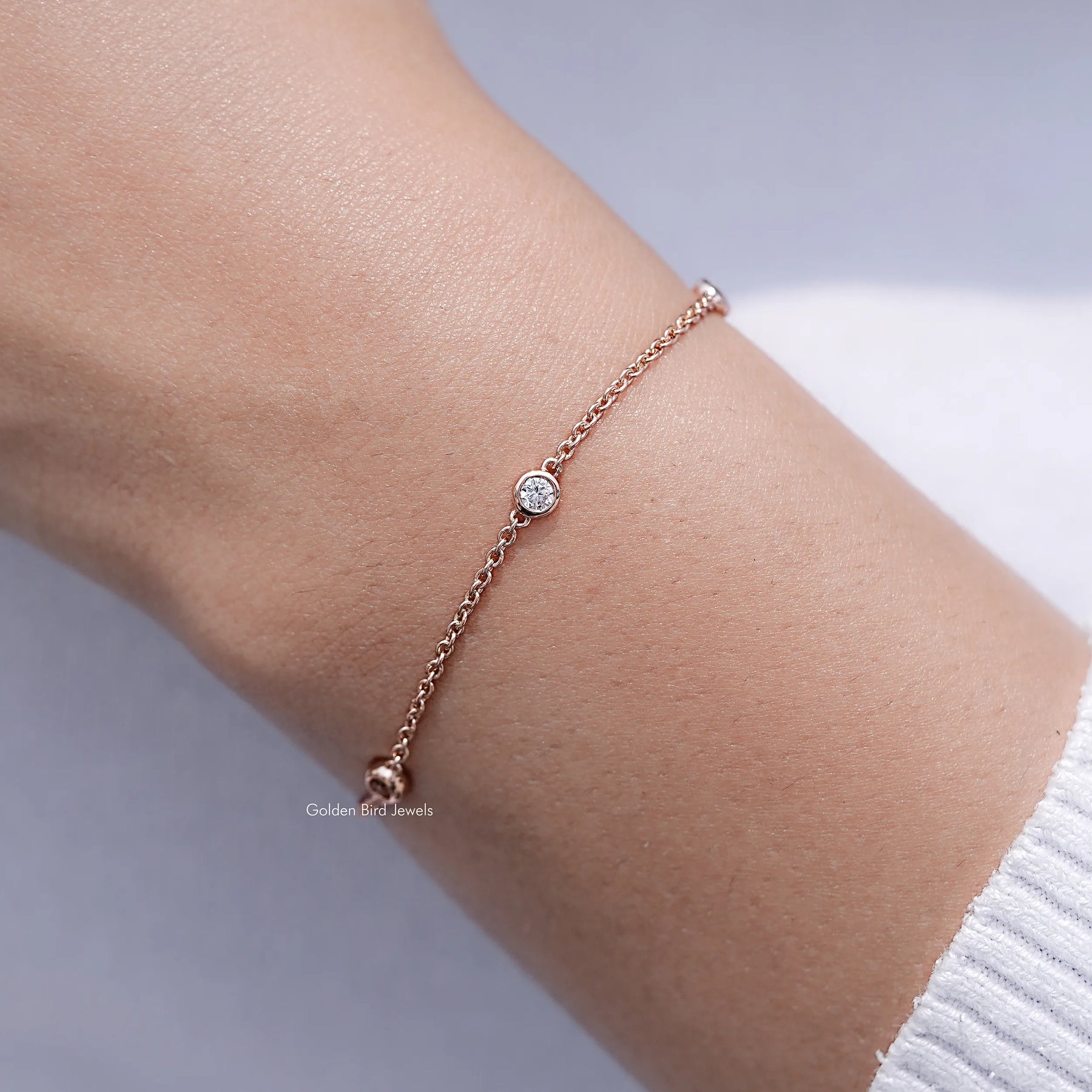 In hand Showing View Of Round Cut Lab Diamond Station Steel Bracelet
