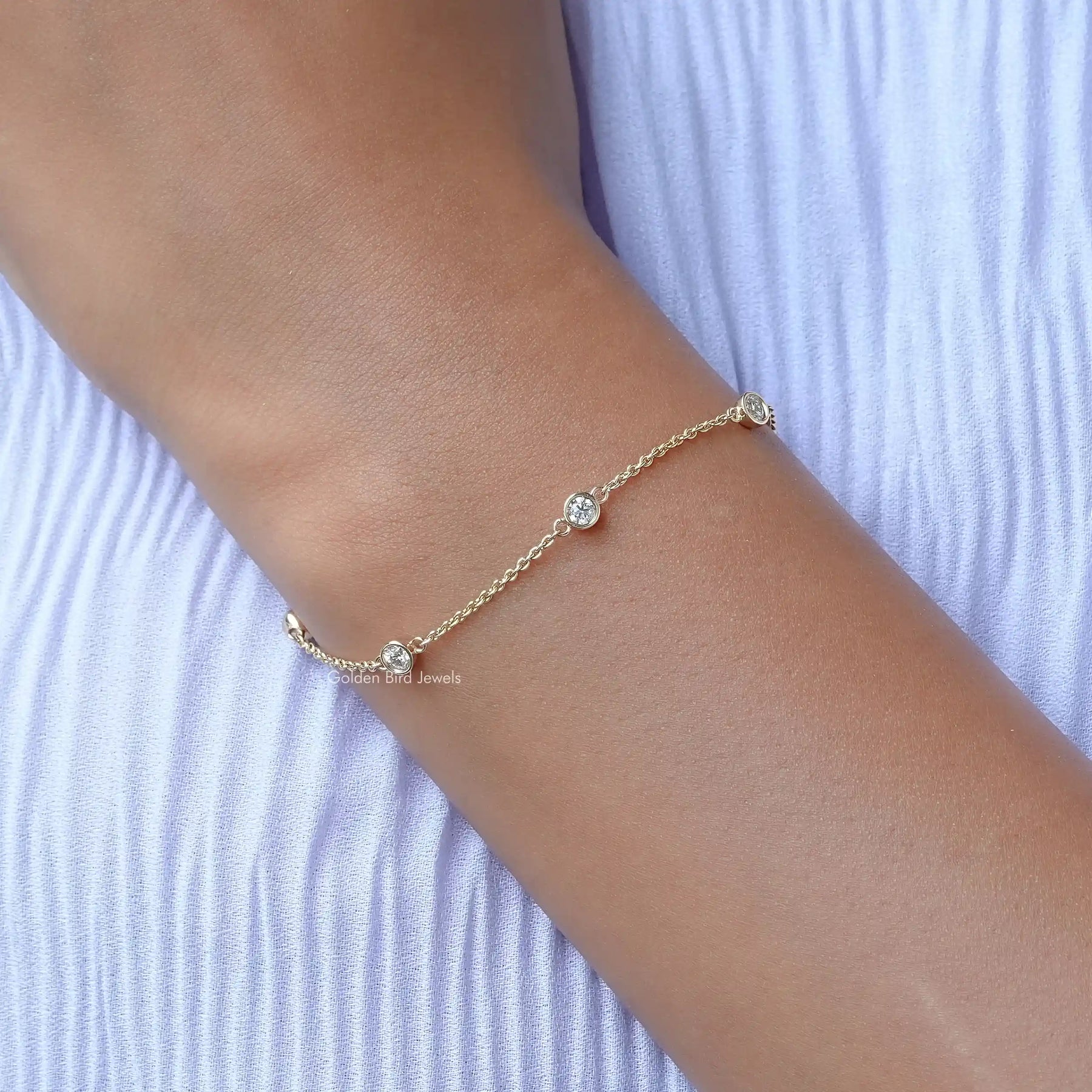 Close view of moissanite chain bracelet in secure setting