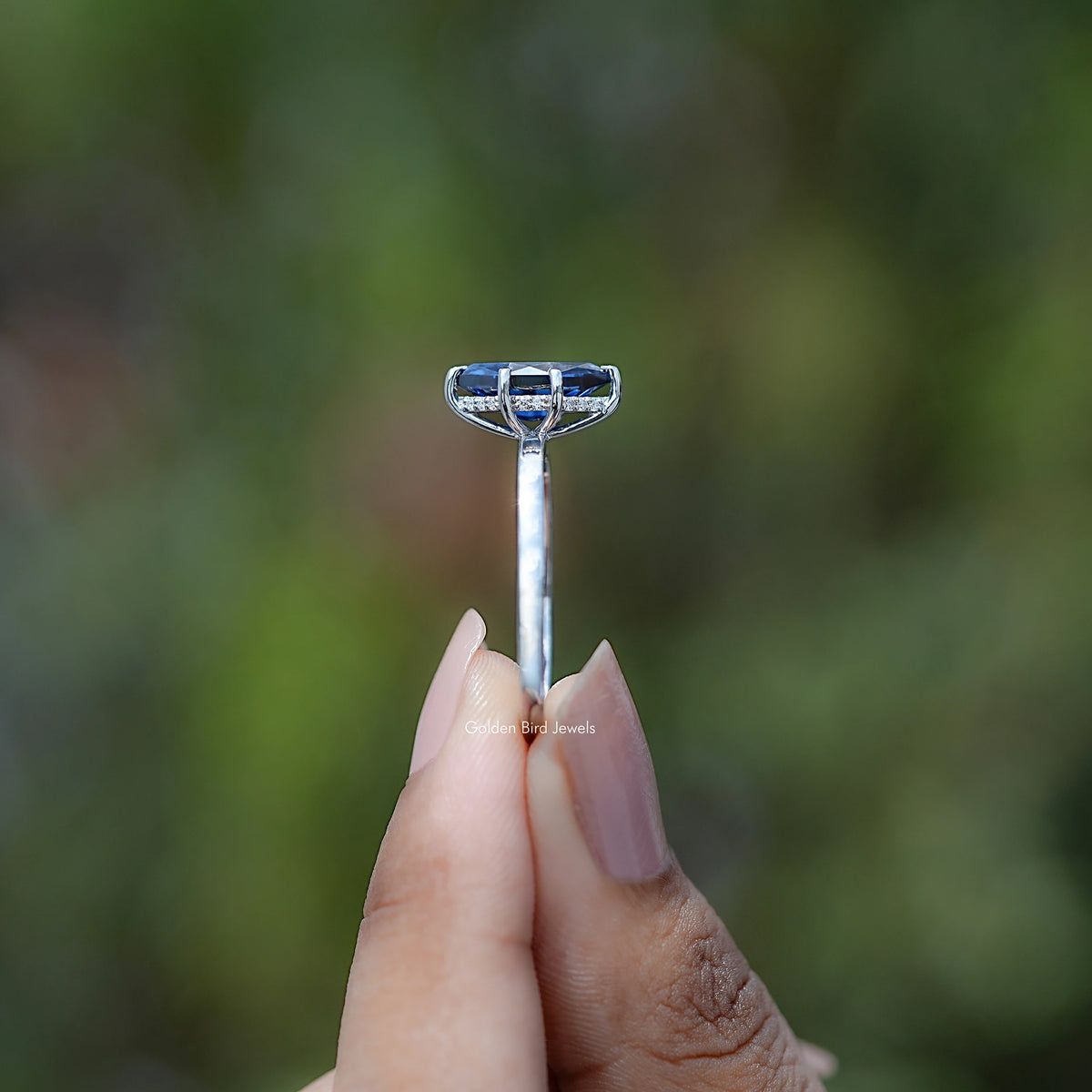Side view of Blue Dutch Marquise Cut Moissanite Hidden Halo Ring