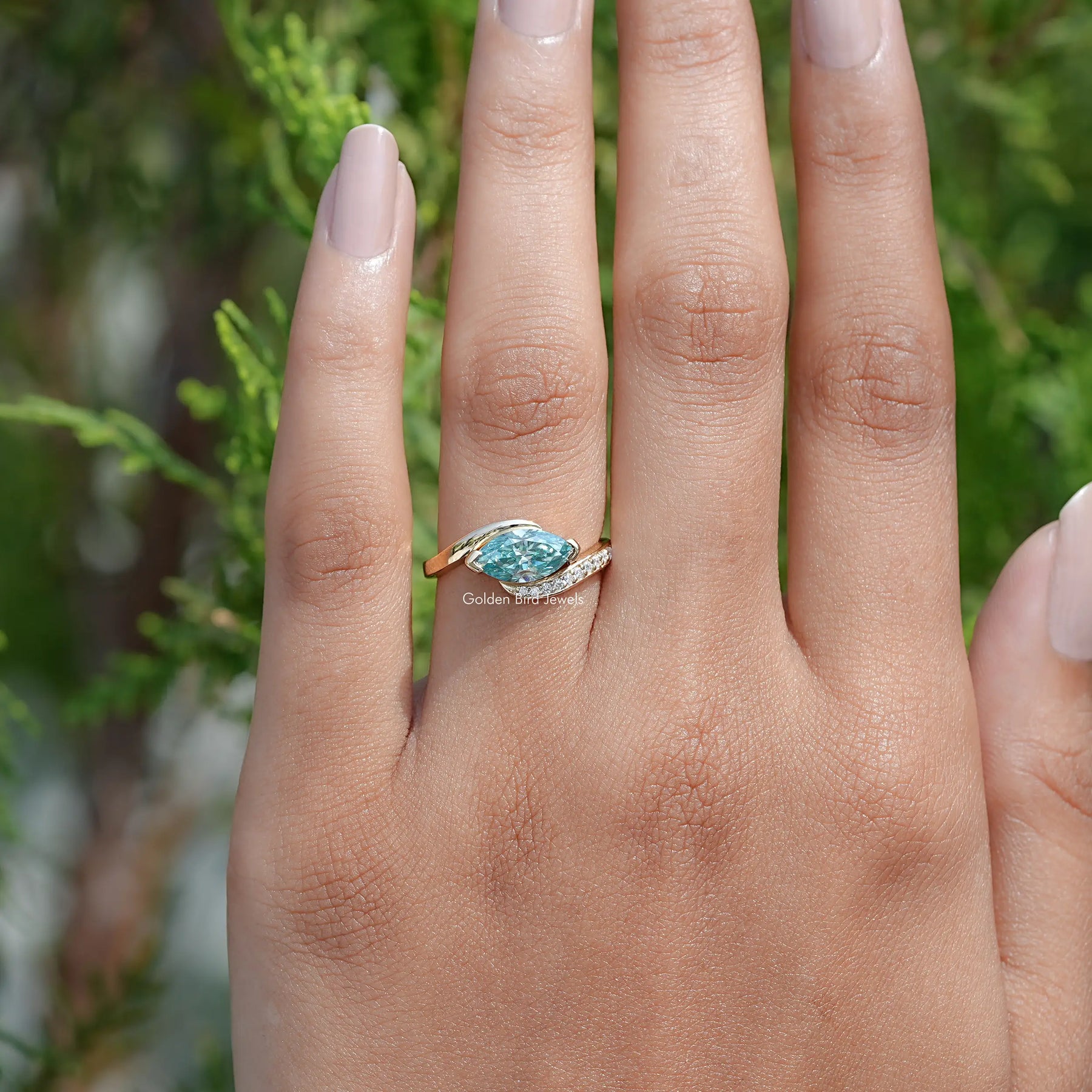 View of East West Blue Marquise Moissanite Bypass Ring