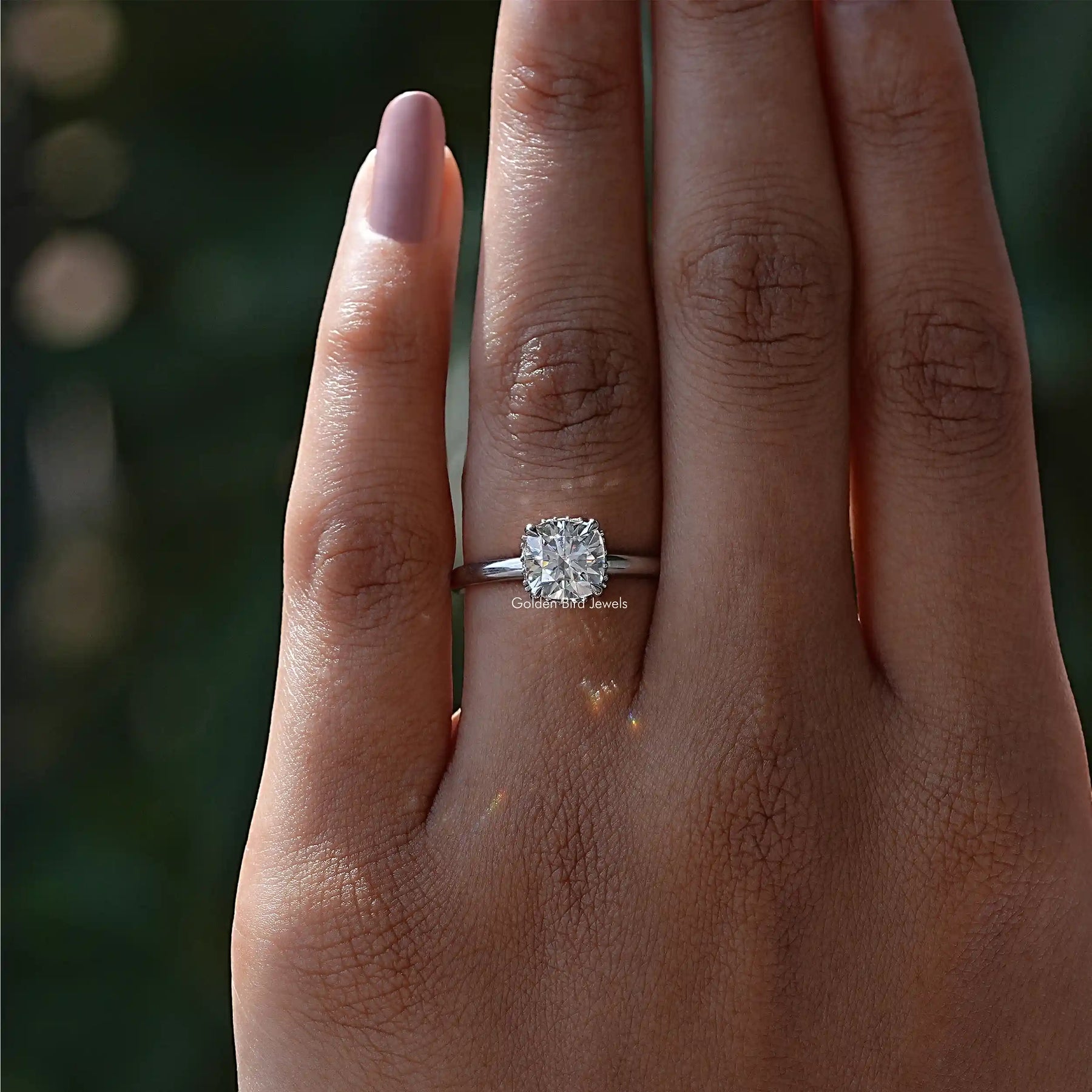 In finger front view of Lab Diamond Cushion Cut Ring