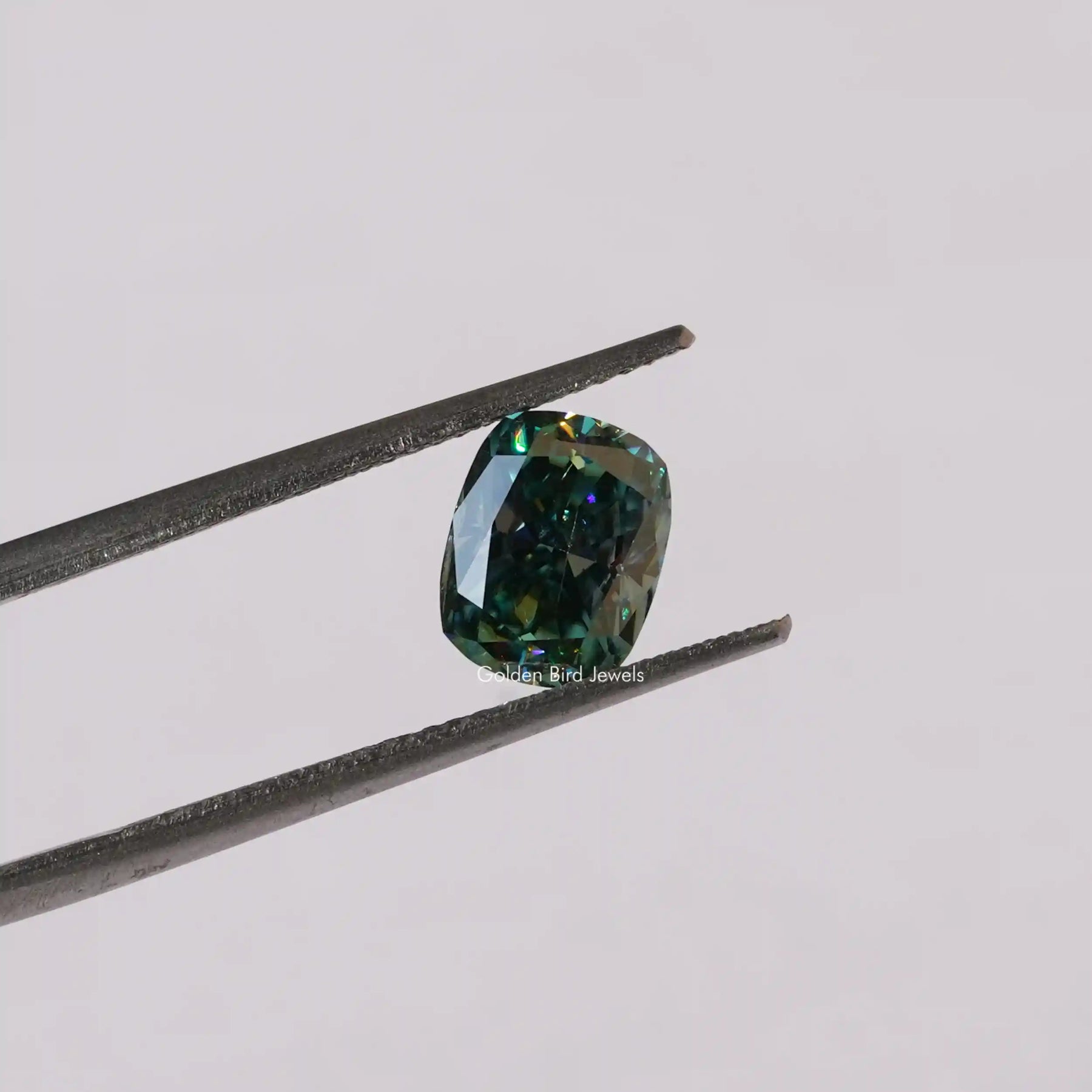 In Tweezer View Of Moissanite Cushion Cut Loose Stone