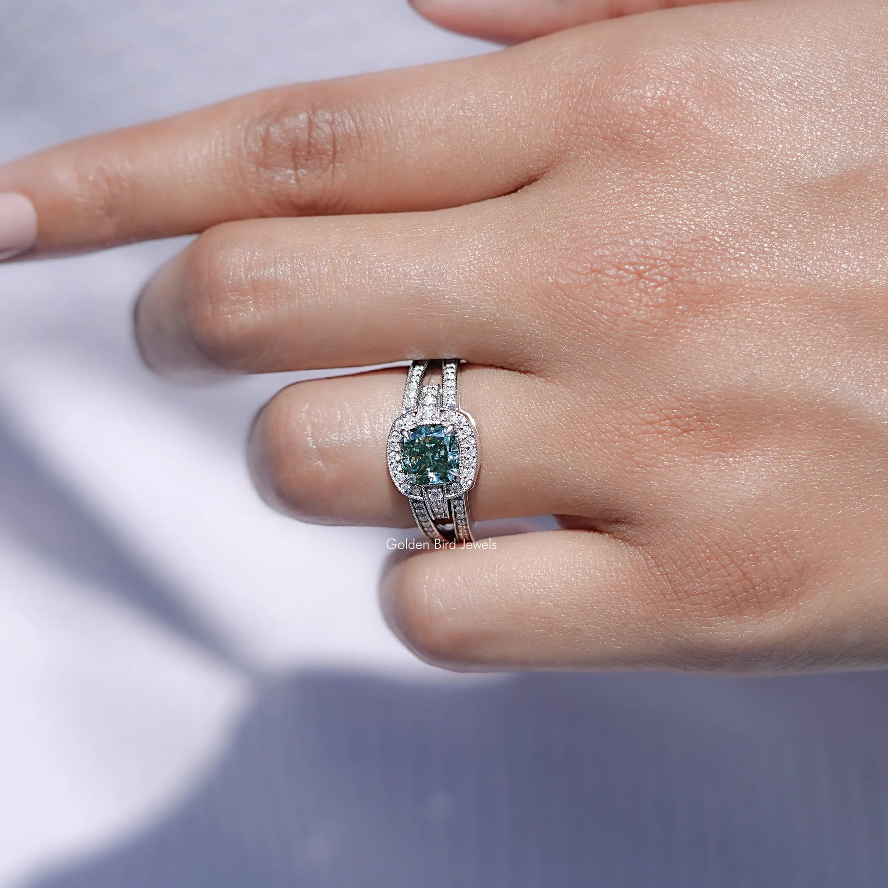 Cushion cut solitaire moissanite ring in white gold