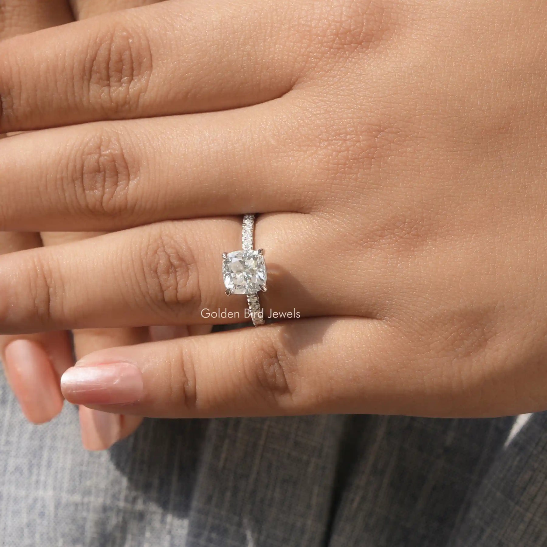 Close-Up View of Cushion Cut Moissanite Engagement Ring In White Gold
