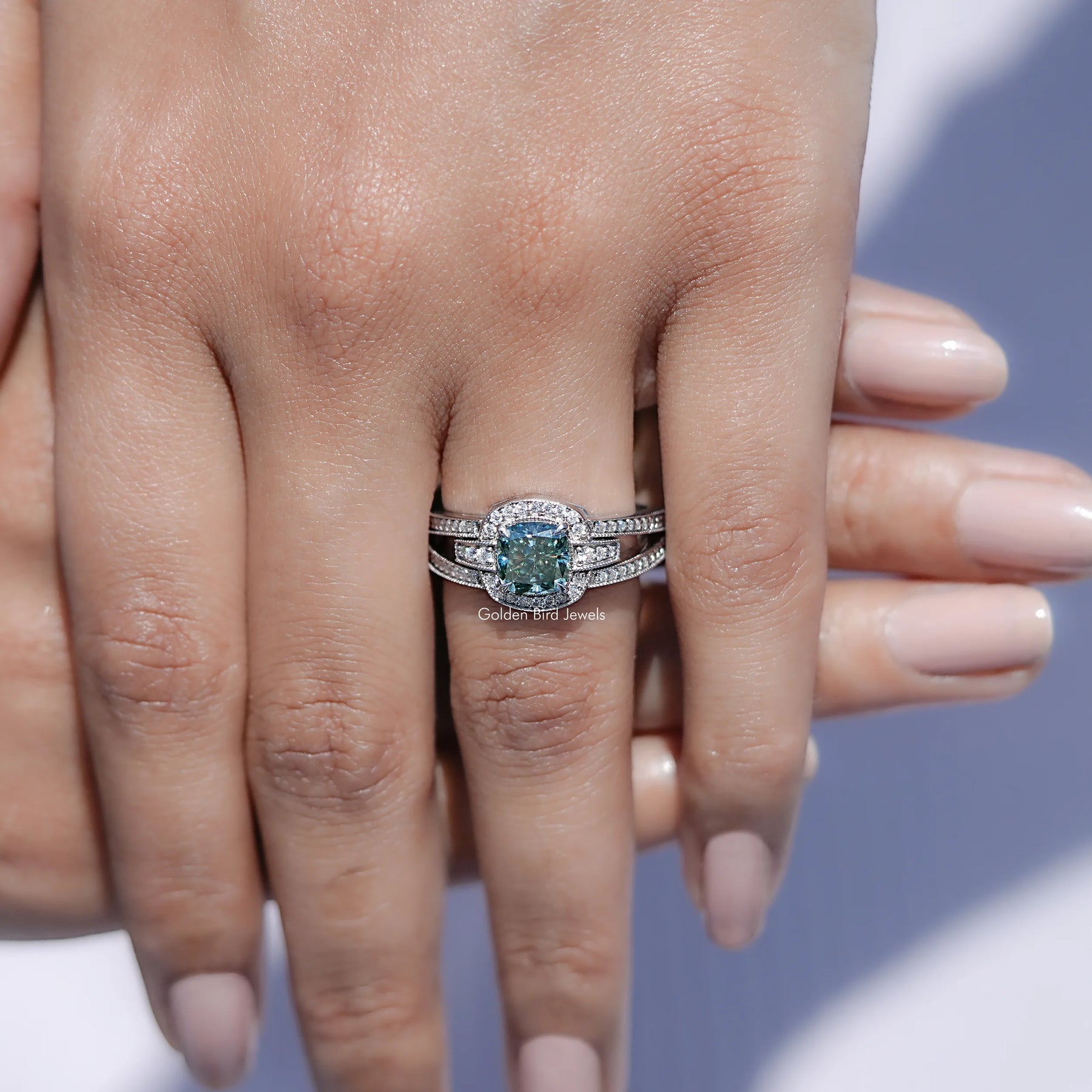 View of solitaire cushion Moissanite ring in prongs setting