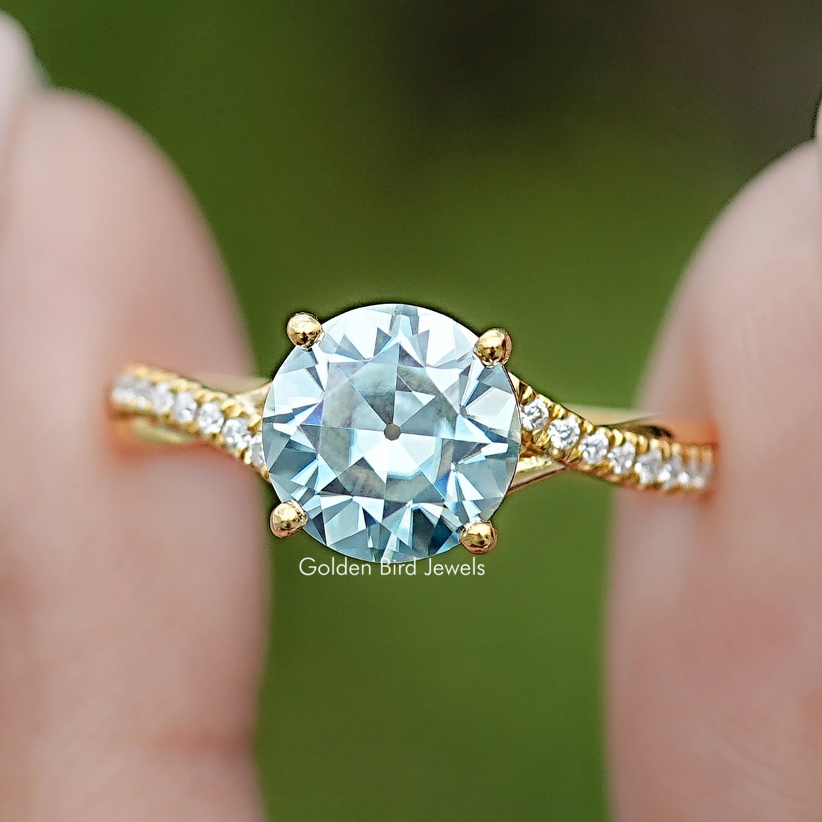 Front view of Cyan Blue Old European Round Moissanite Ring