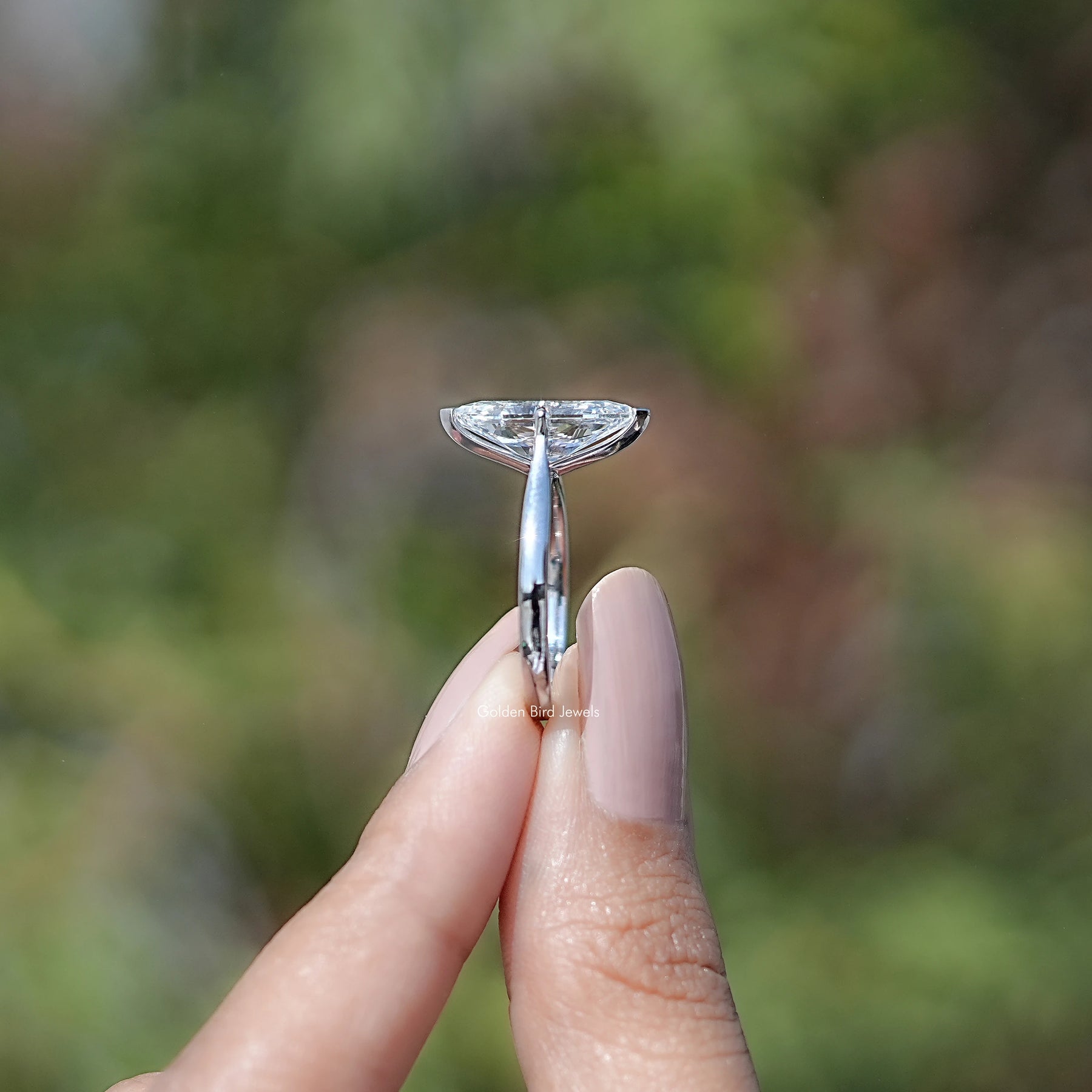 Side View Of Marquise Cut Lab Diamond Solitaire Ring in finger