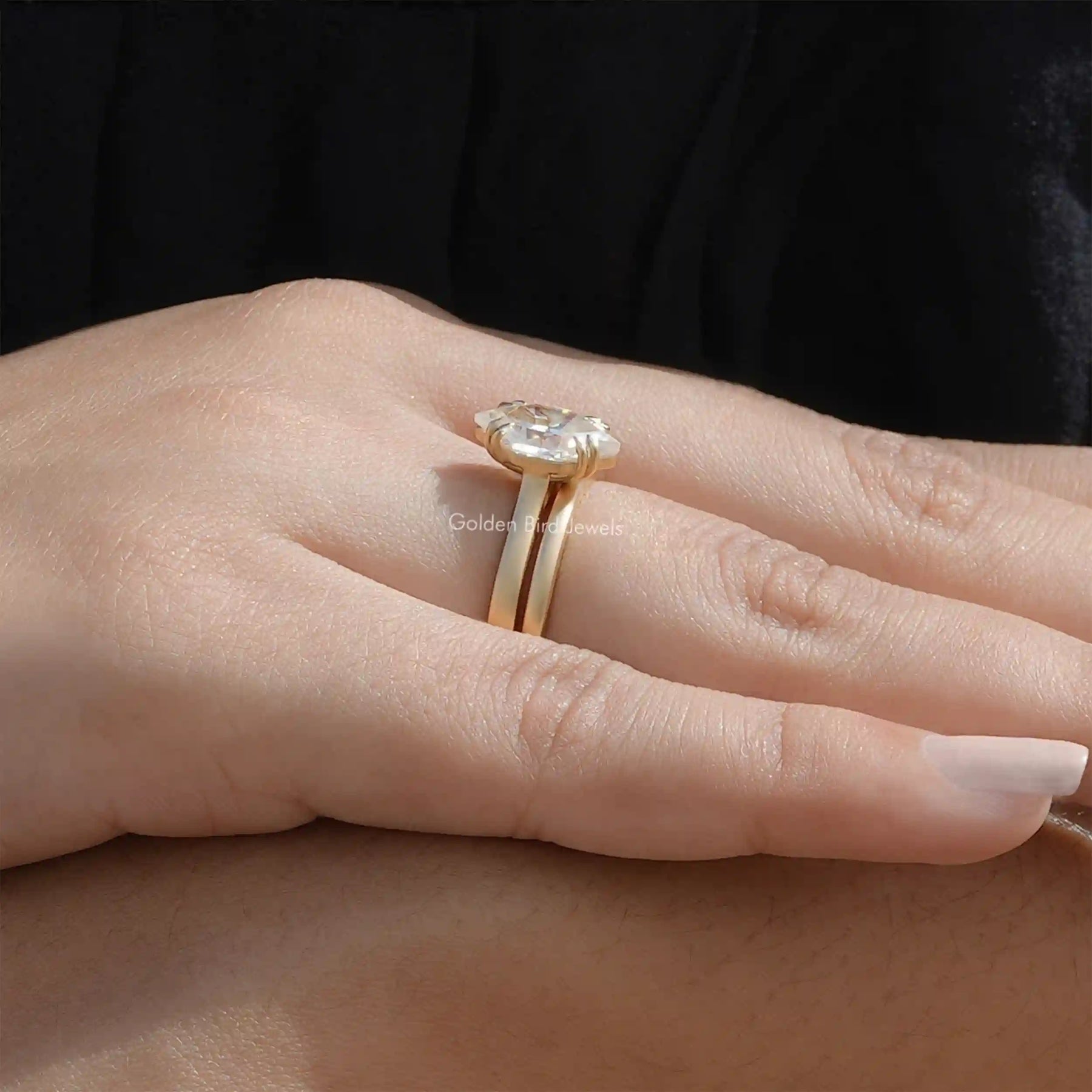 In finger side view of Double Dutch Marquise Cut Solitaire Ring for bridal