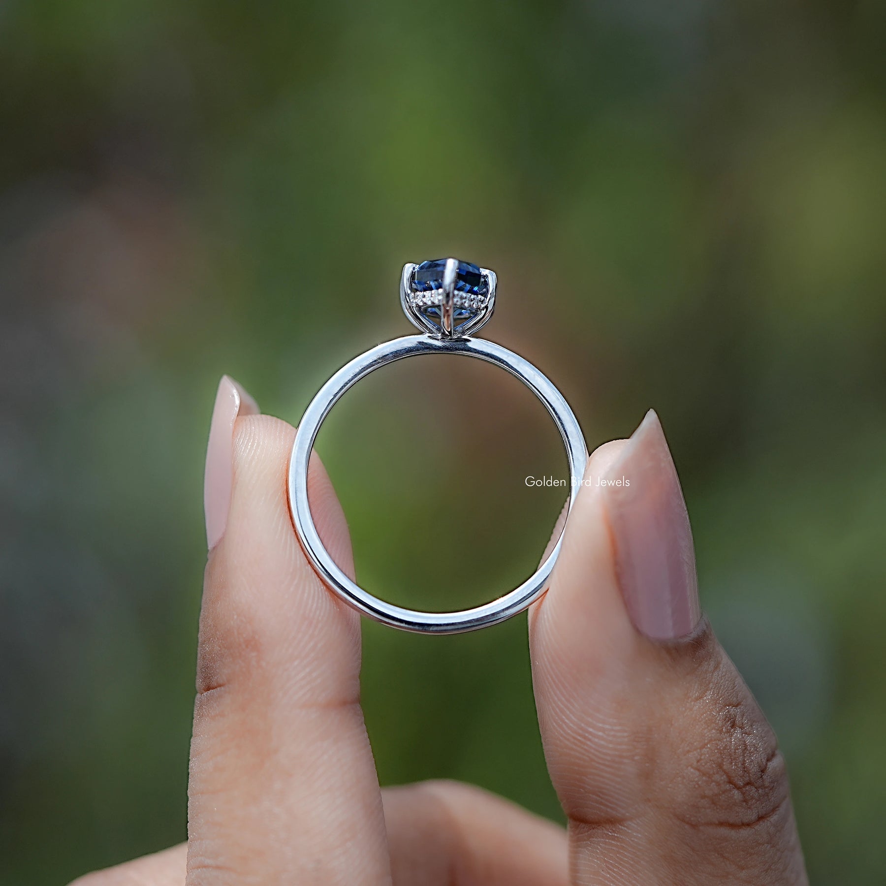 Back view of Dutch Marquise Cut Hidden Halo Ring in secure setting