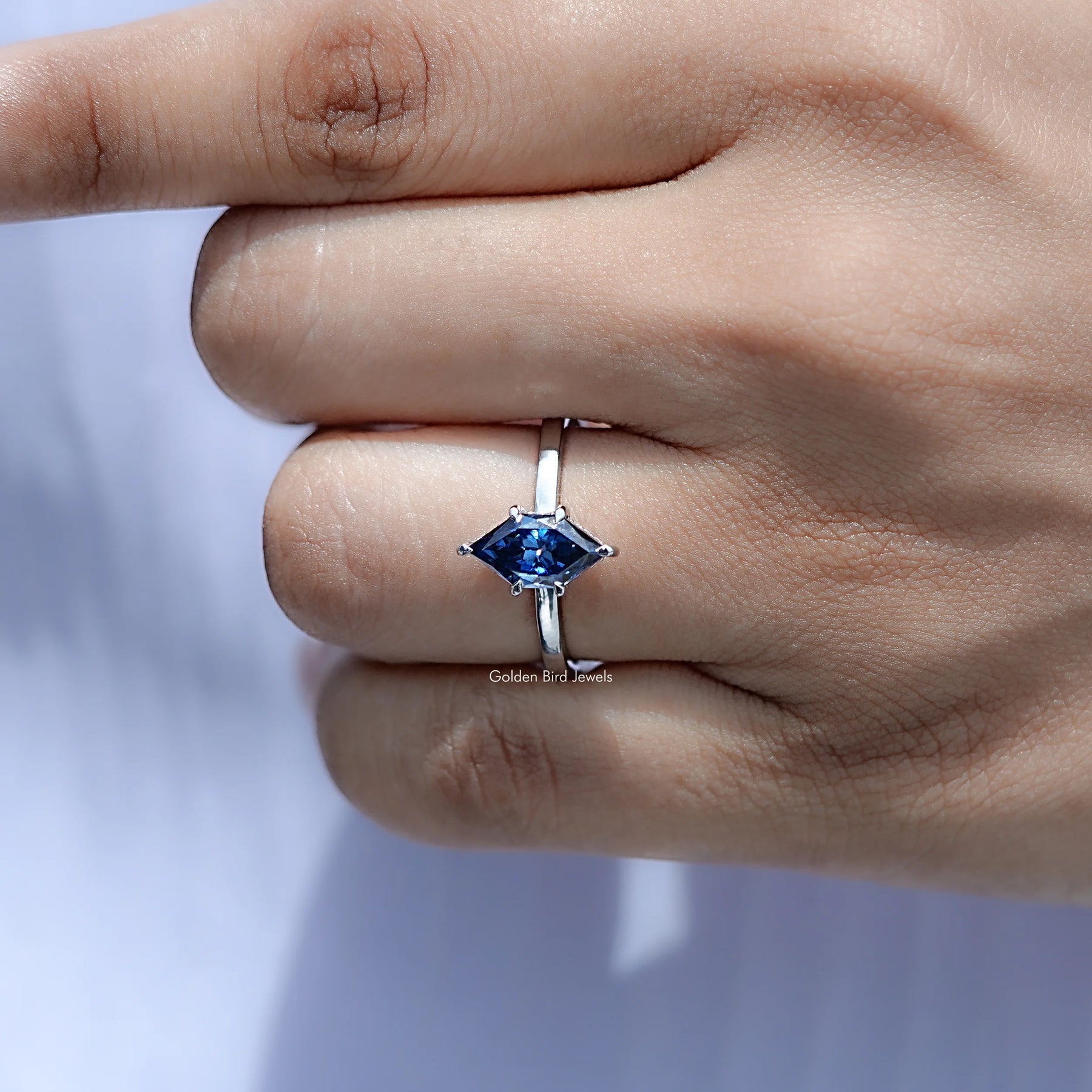 In finger view of Dutch Marquise Moissanite Ring