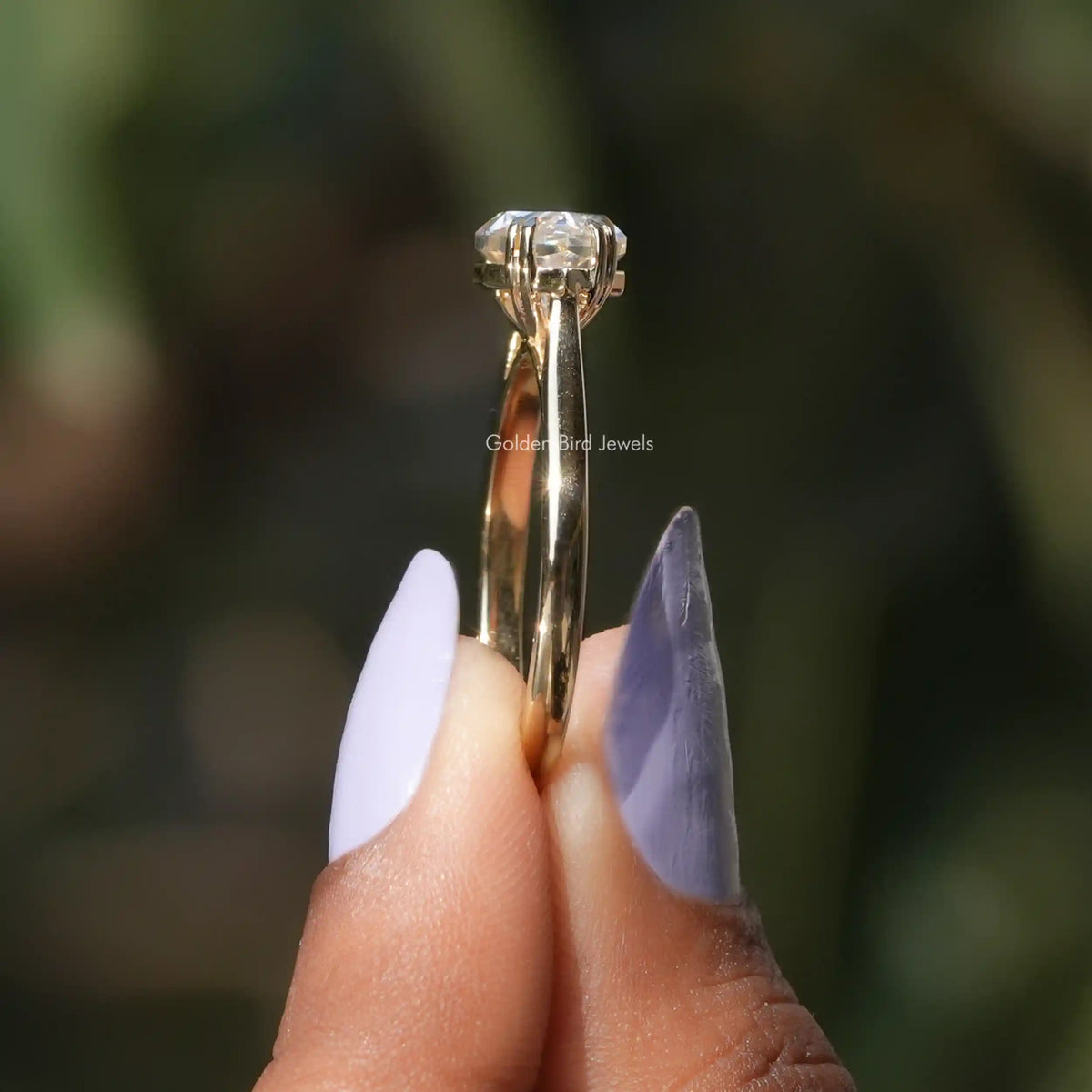 Side View of Dutch Marquise East To West Moissanite Solitaire Ring In finger