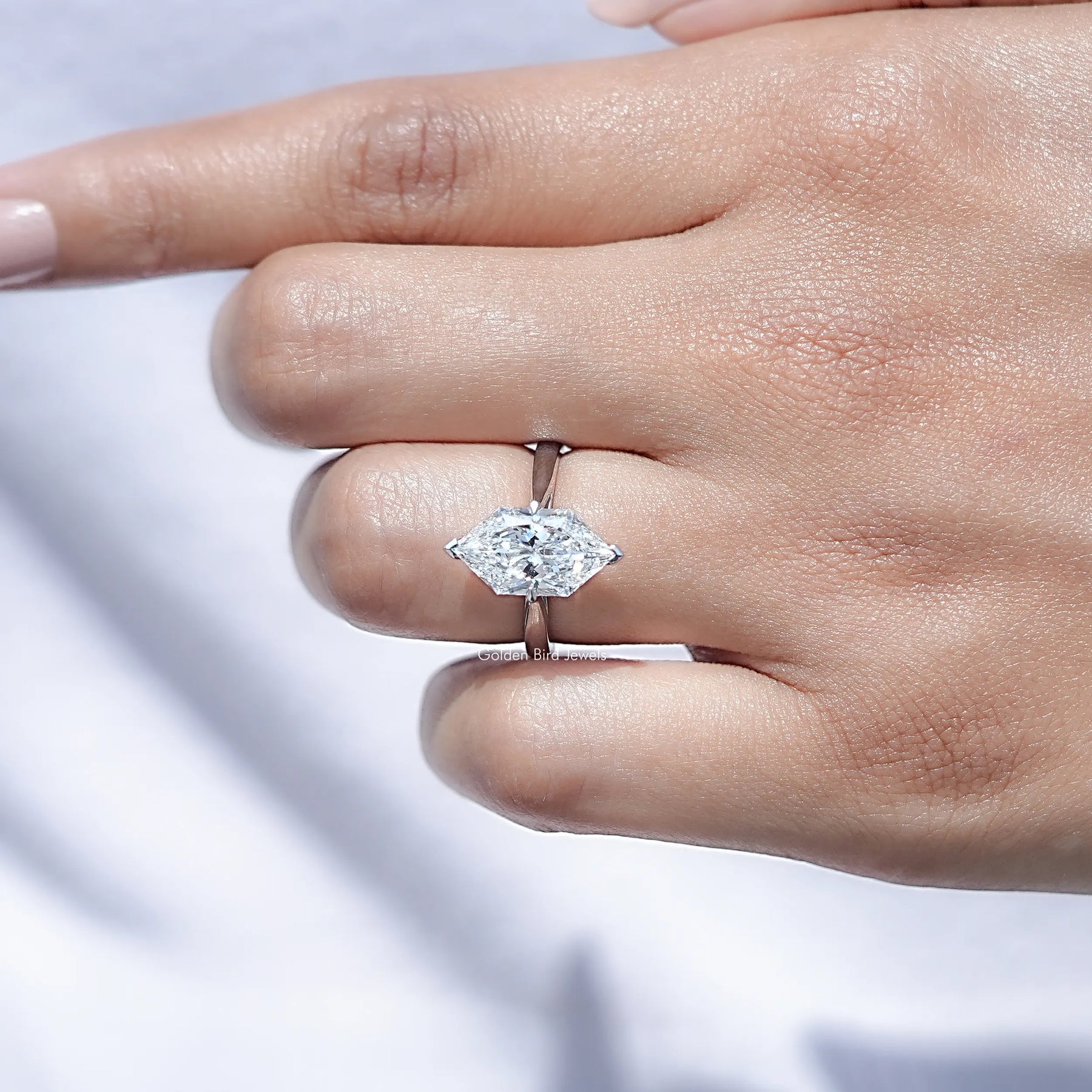 Front view of Dutch Marquise Cut Lab Diamond Solitaire Ring in hand