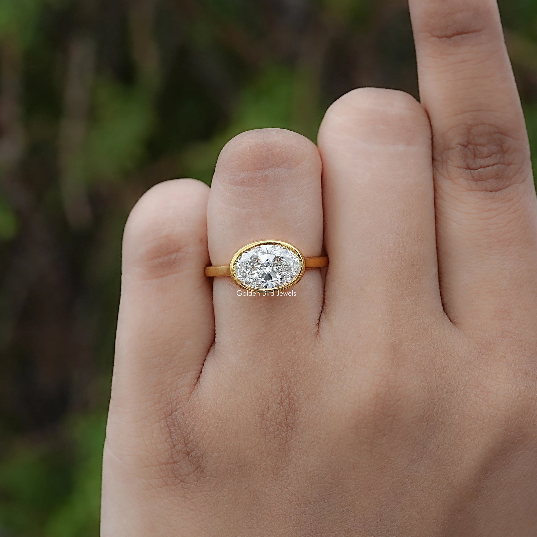 East West Oval Cut Lab Diamond Bezel Set Ring
