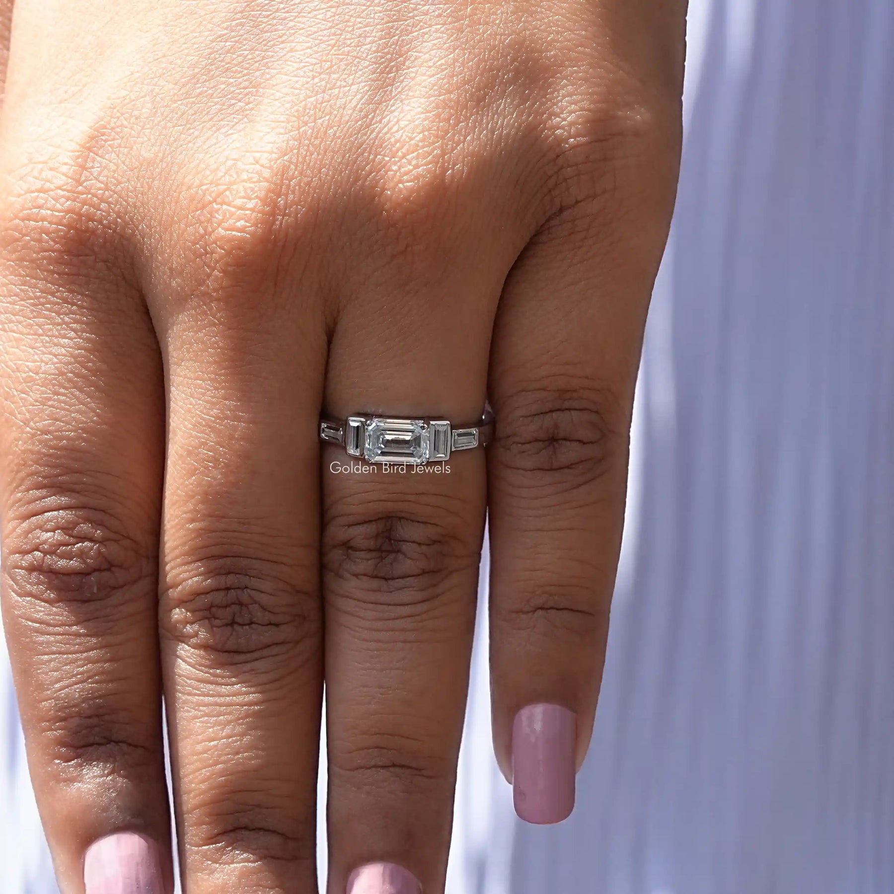 Emerald And Baguette Moissanite Engagement Ring In White Gold
