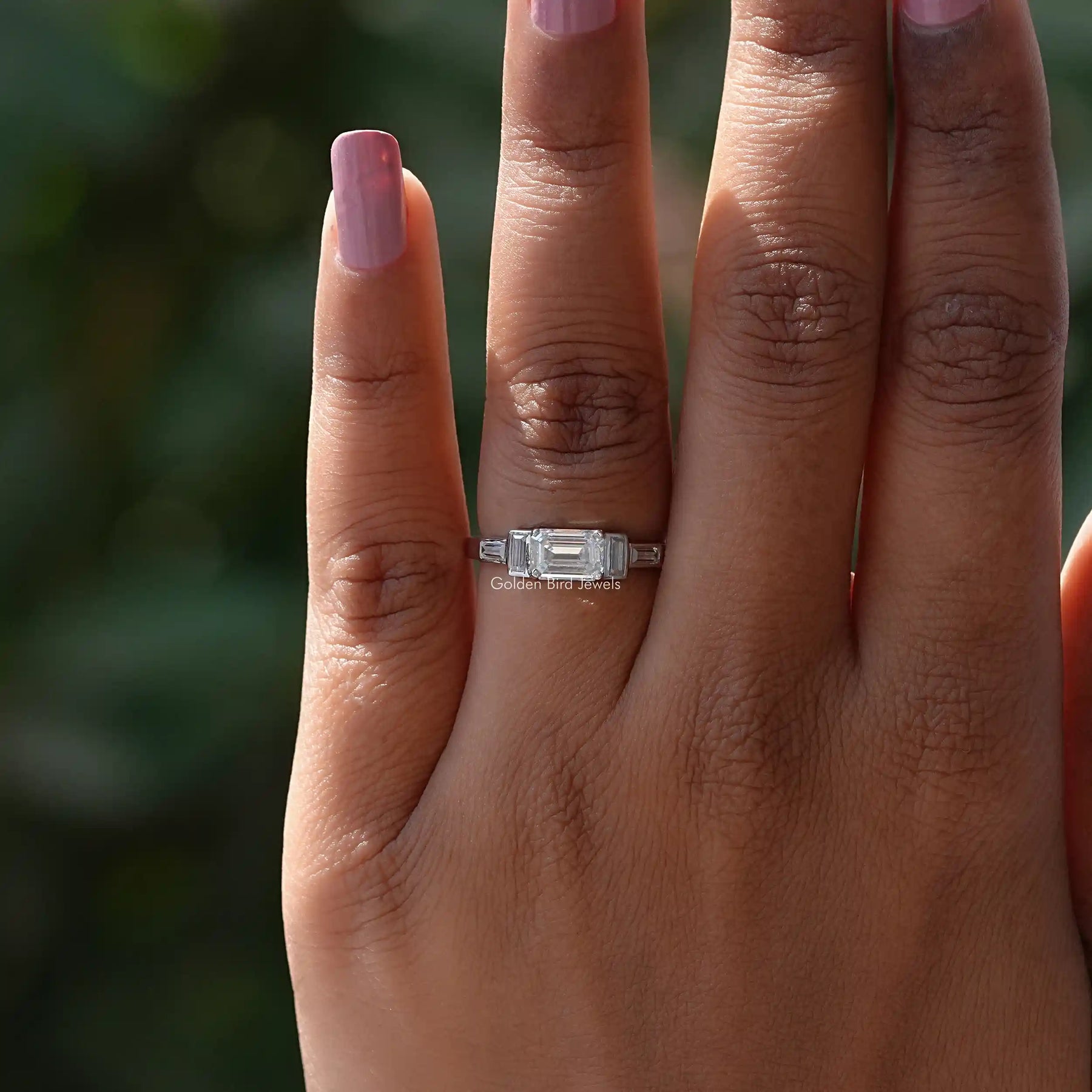 Detailed View Of Emerald Cut Moissanite Five Stone Ring In White Gold