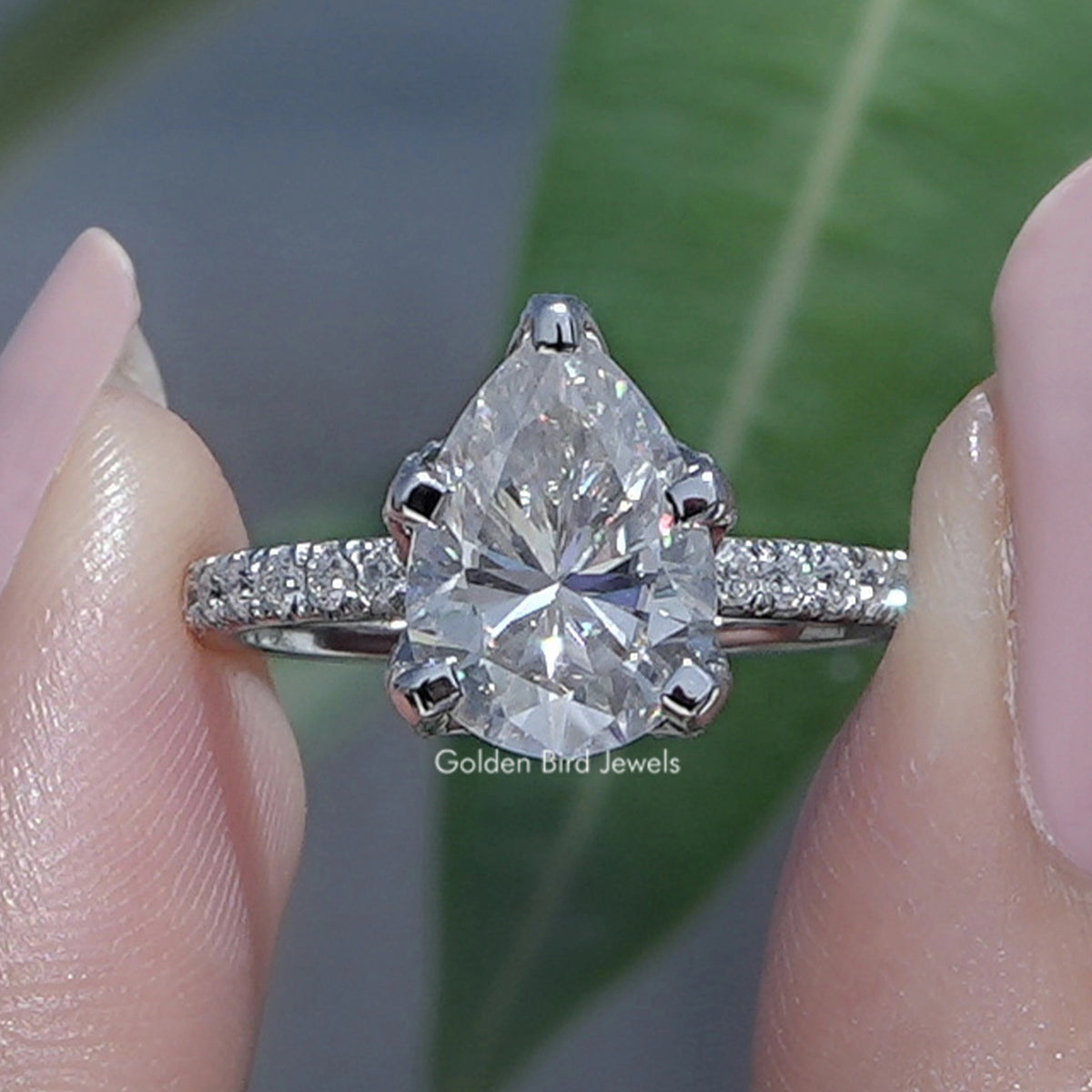 Pear Shaped Moissanite Accent Stone Ring