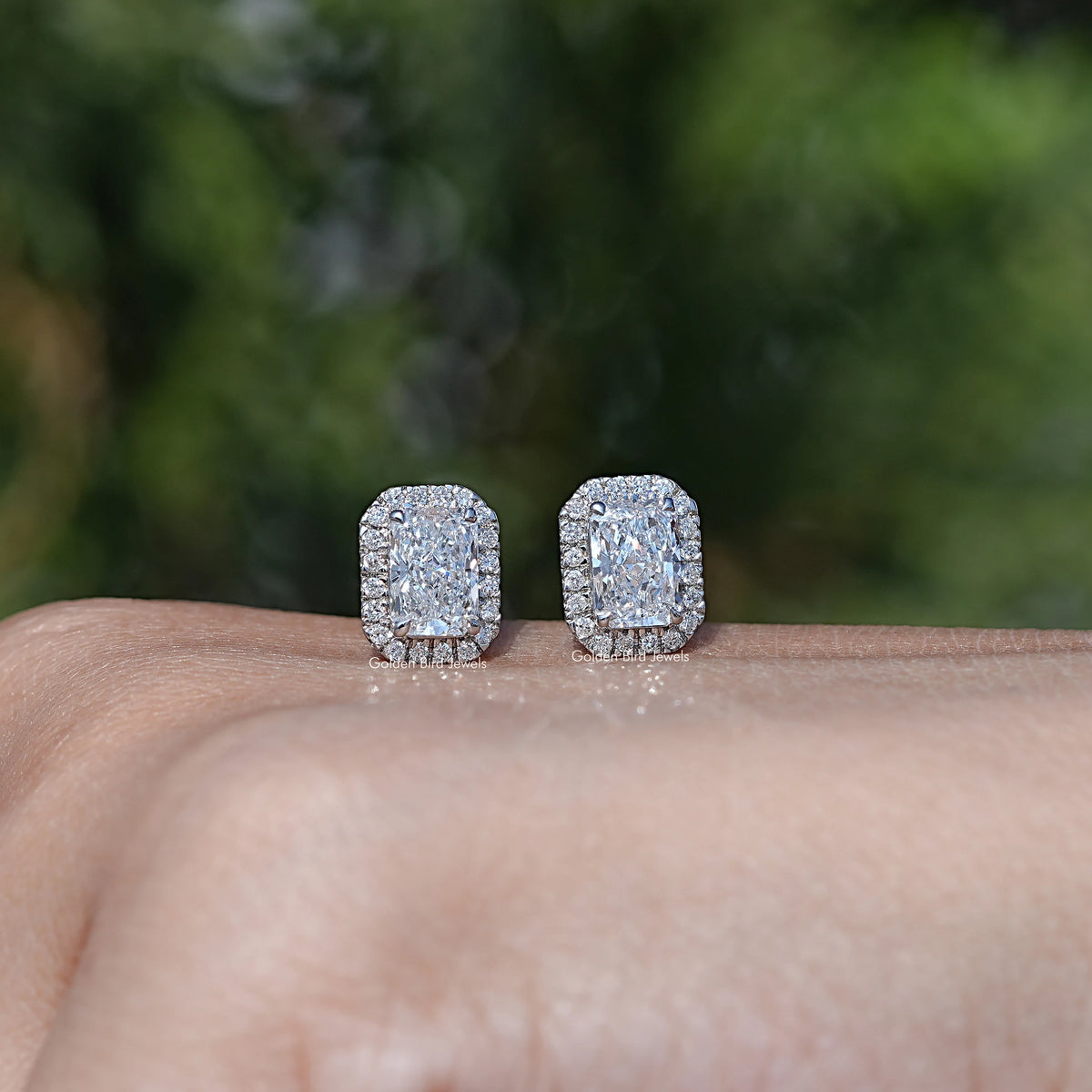 In Hand Front View Of Radiant Cut Diamond Stud Earring In White Gold