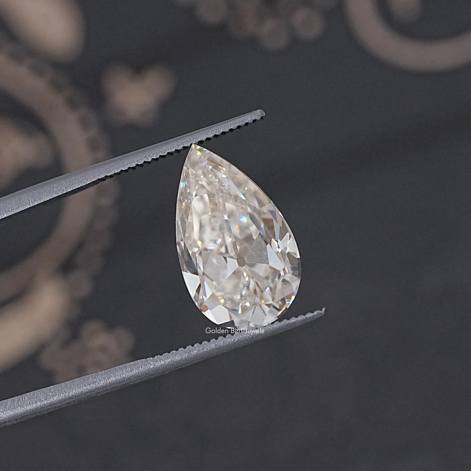 Off White Old Mine Pear Loose Moissanite
