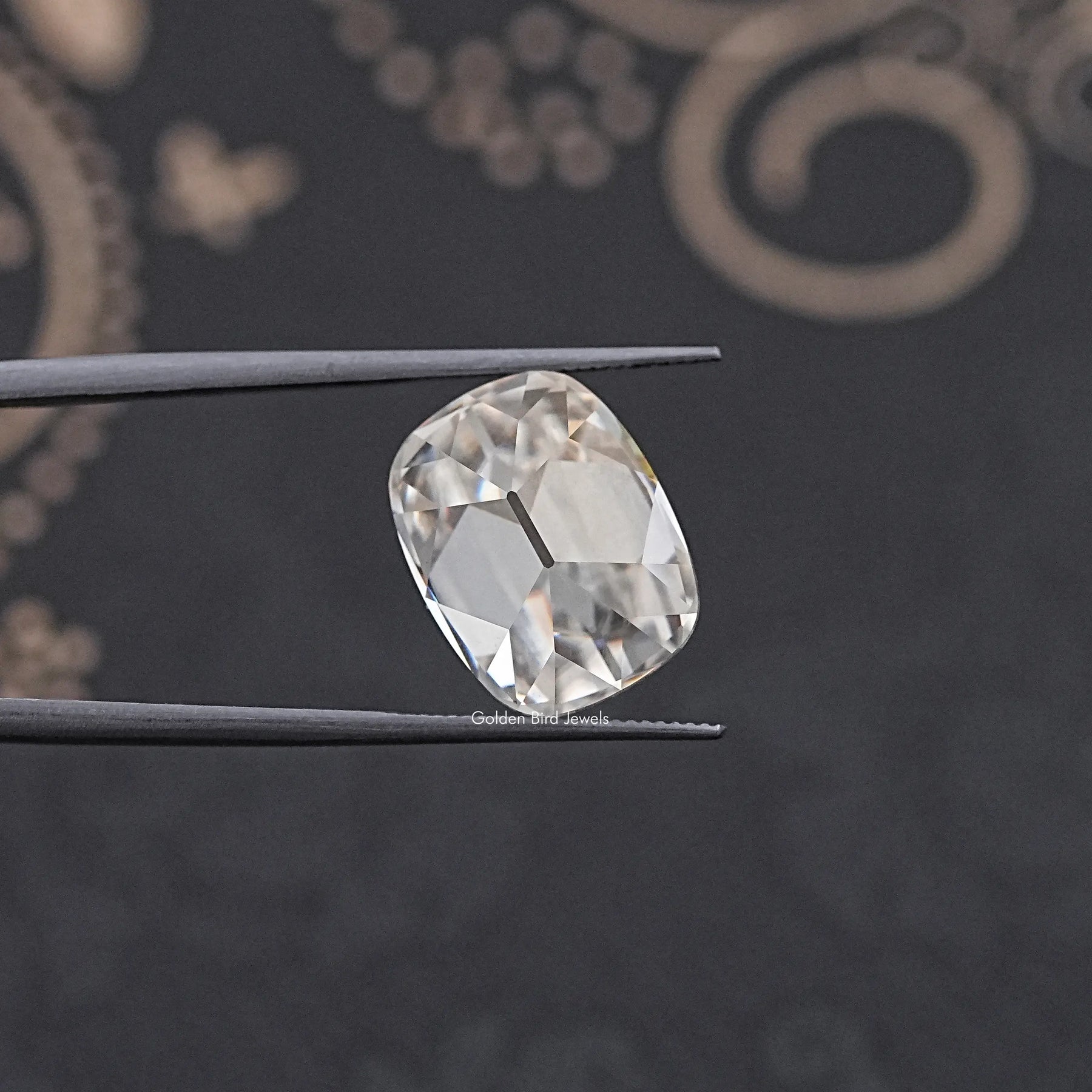 In Tweezer View Of Old Mine Cushion Cut Loose Moissanite Stone