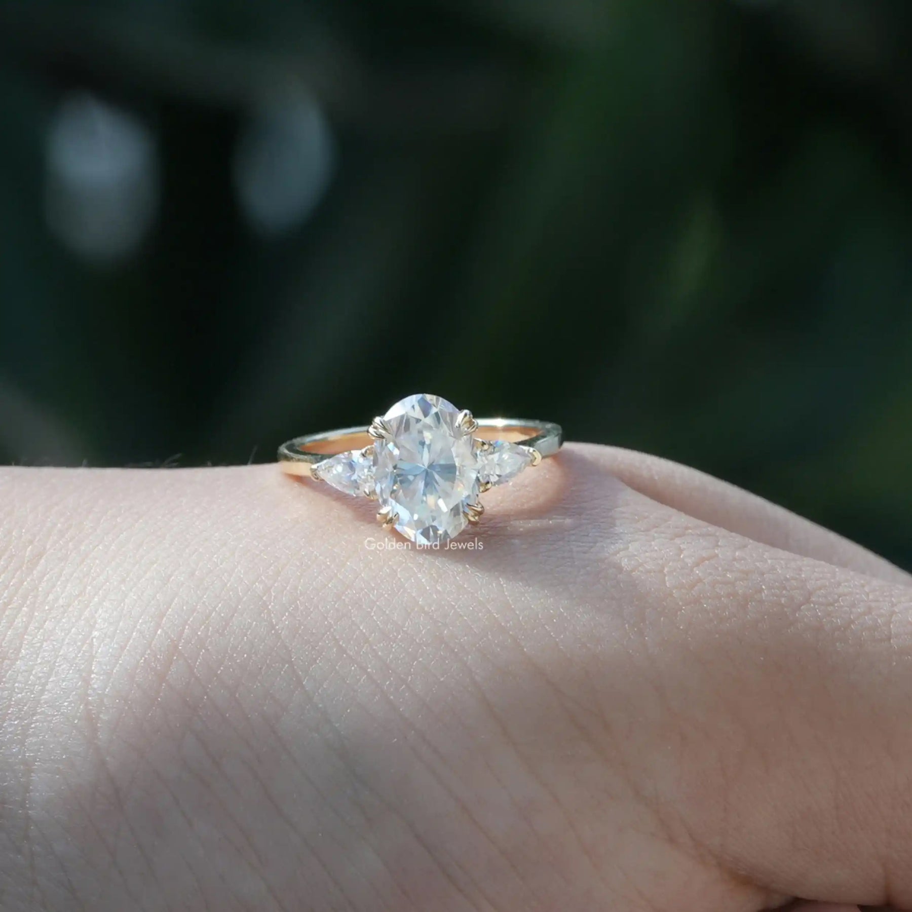 Oval And Pear Cut Moissanite 3 Stone Engagement Ring