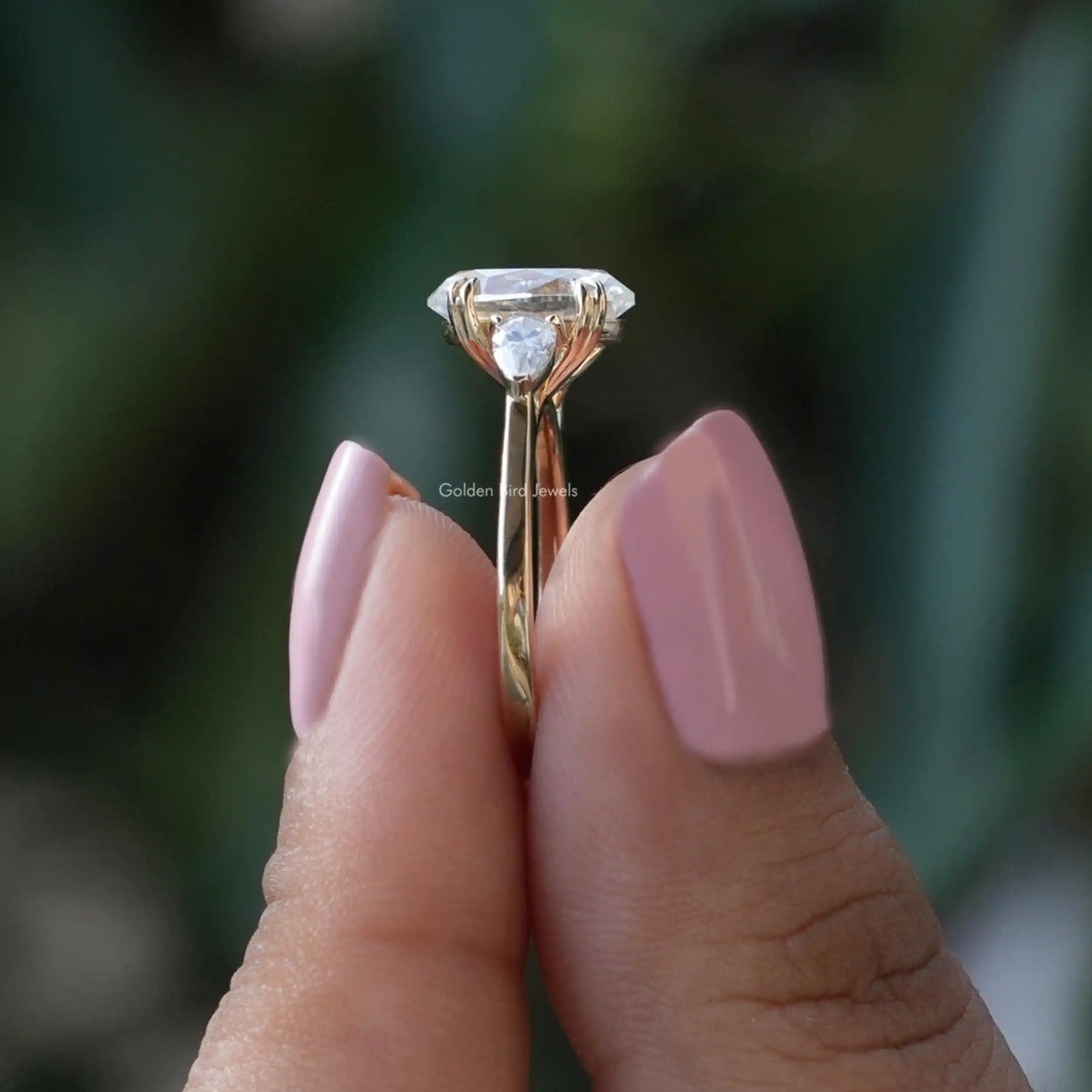 Oval And Pear Cut Moissanite 3 Stone Engagement Ring