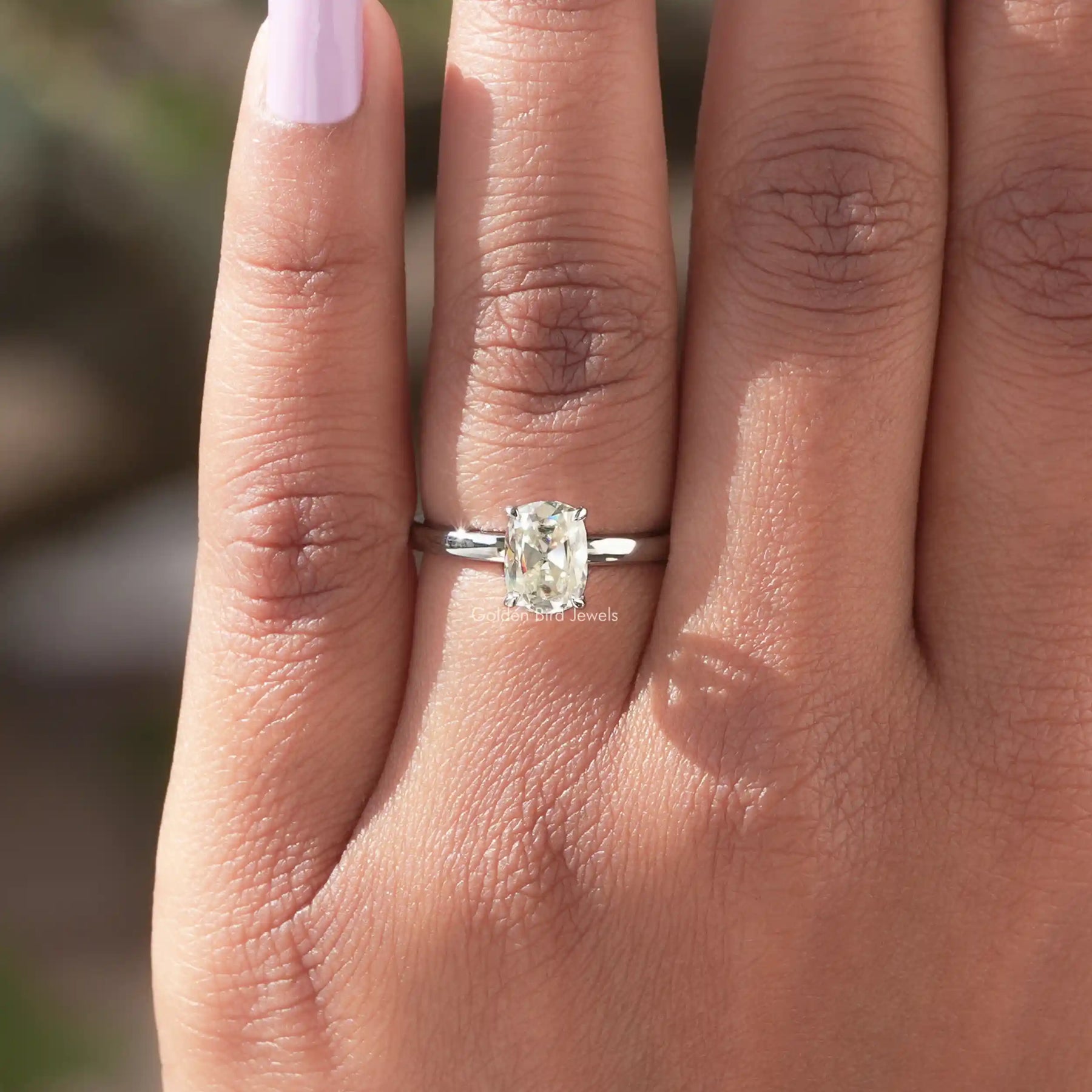 Close-Up View of Cushion Cut Moissanite Solitaire Ring In White Gold