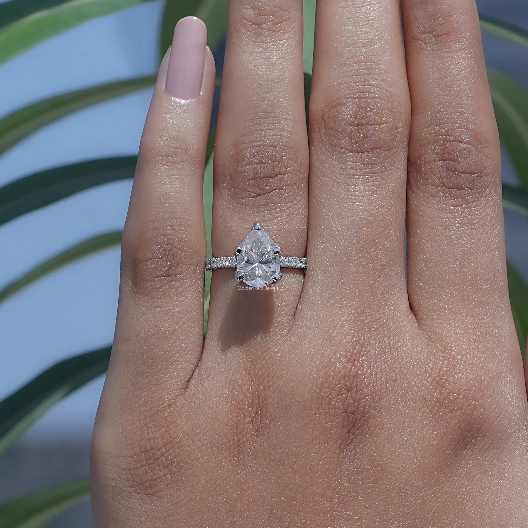 Detailed View Of Pear Cut Moissanite Ring In White Gold