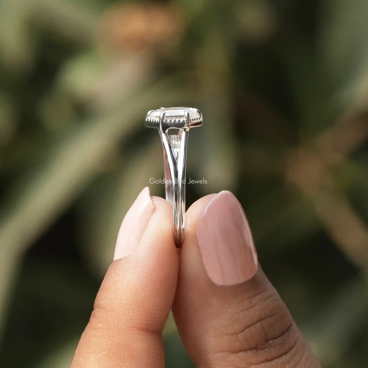 Side View of Hexagon Cut Moissanite Solitaire Ring In two fingers