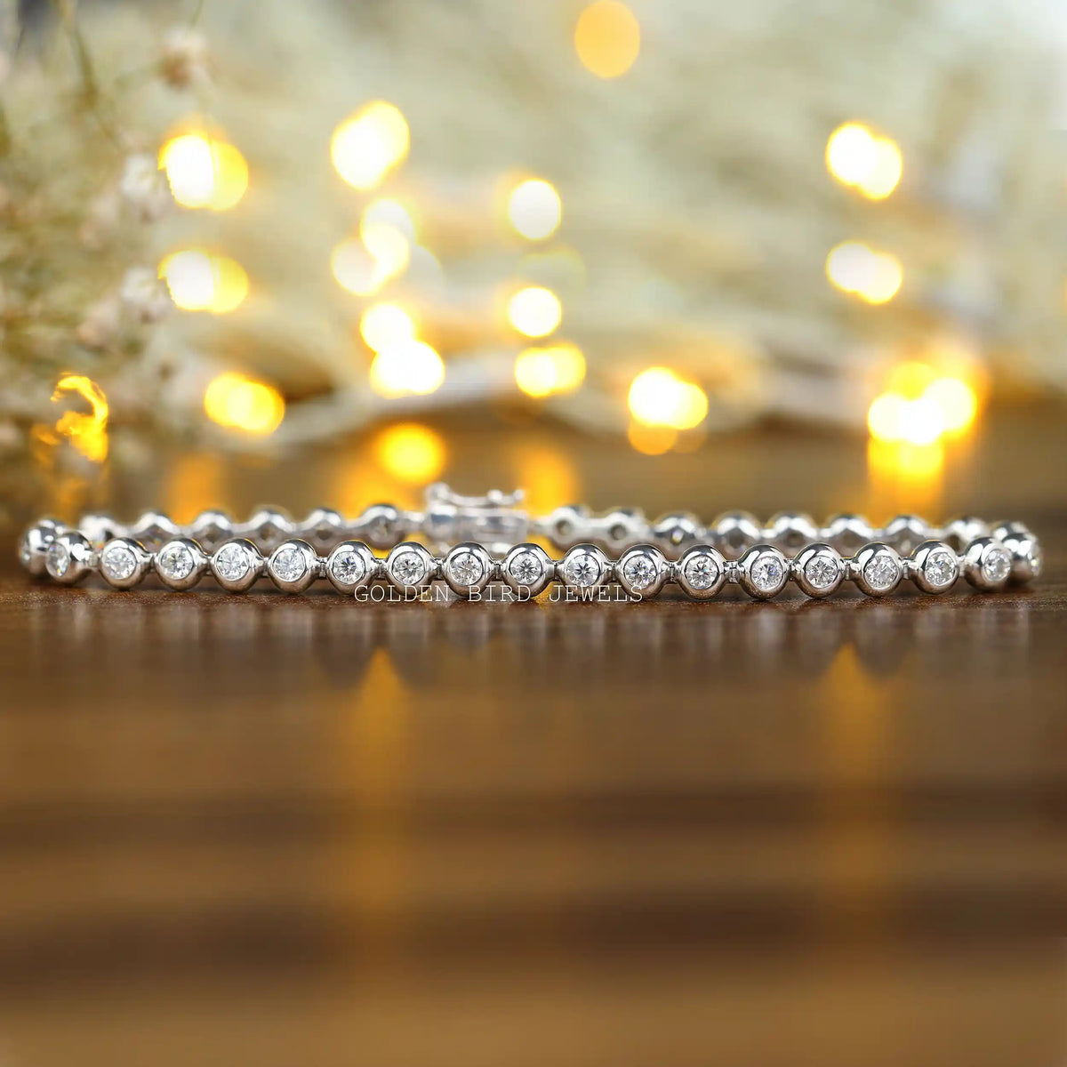 [Front view of moissanite round cut bezel set bracelet in 14k white gold]-[Golden Bird Jewels]