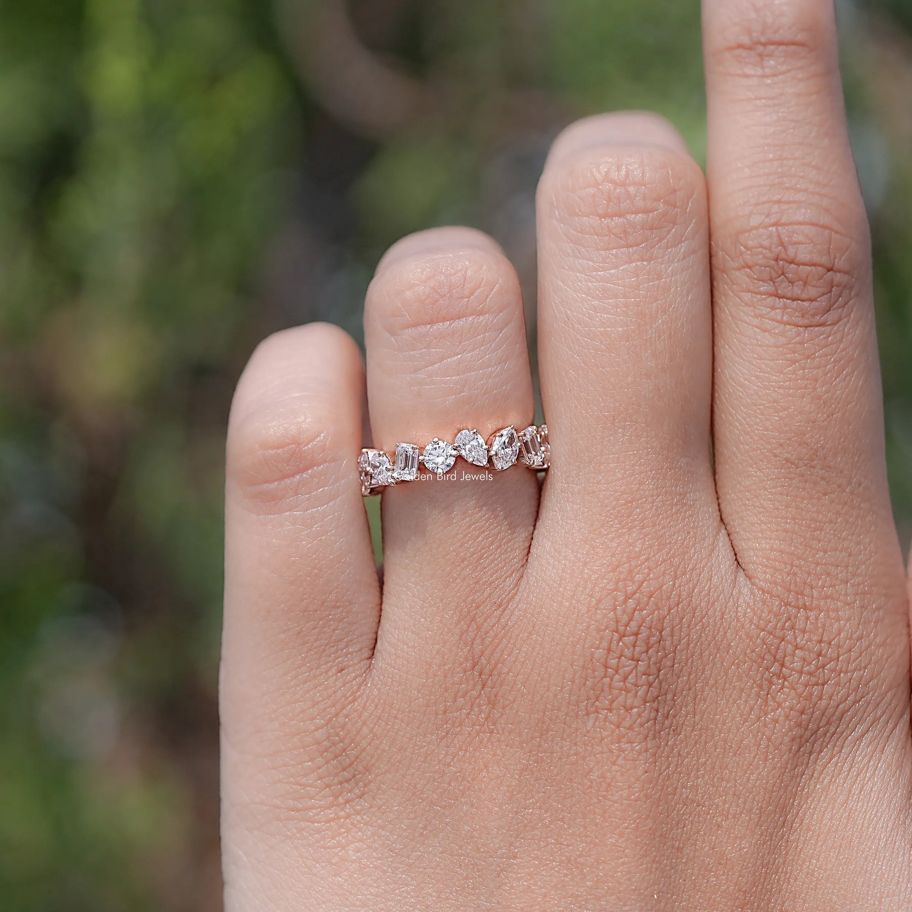 In finger view of Multi Shape Lab Diamond Halo Ring