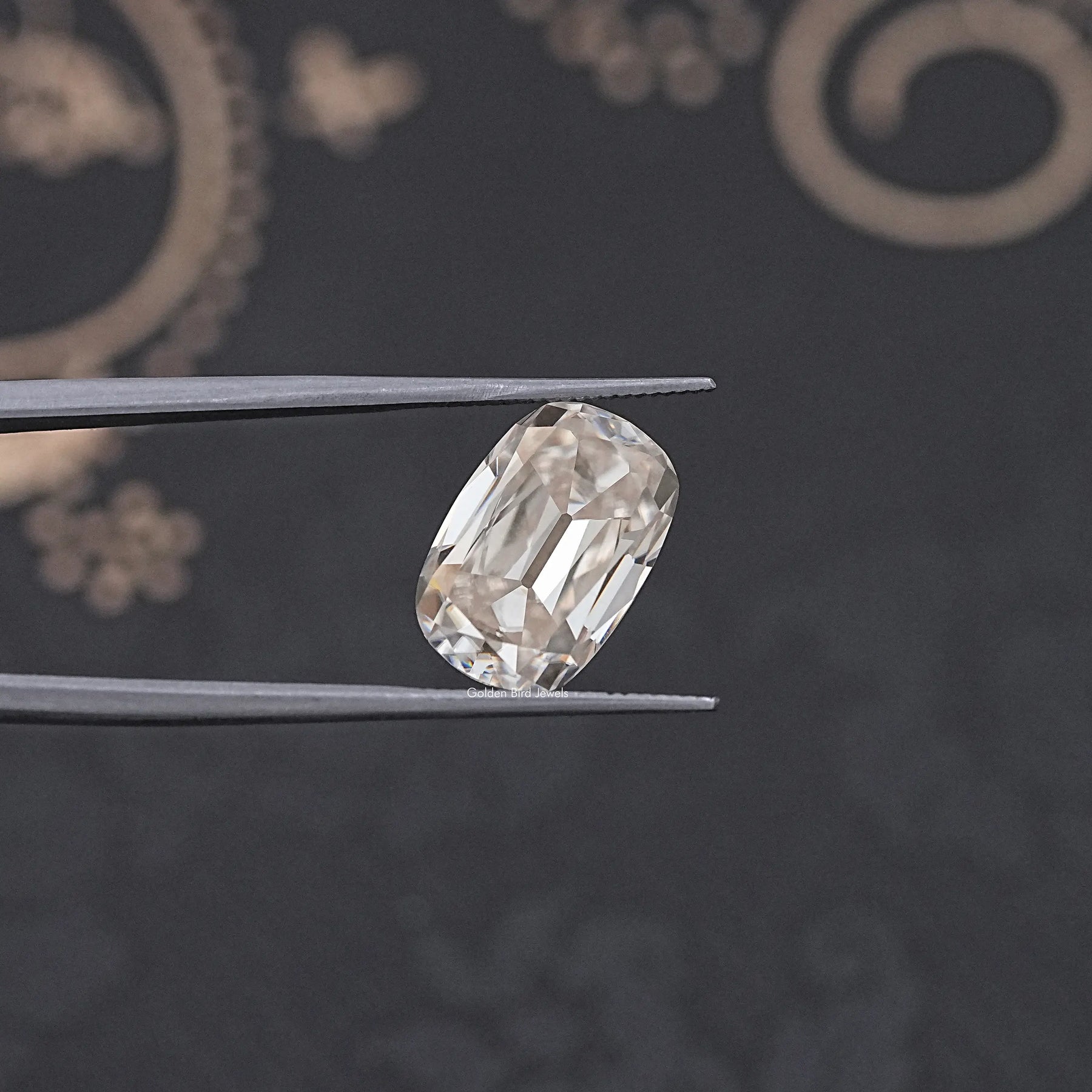 tweezers View of Cushion Old Cut Moissanite Stone for Anniversary Rings