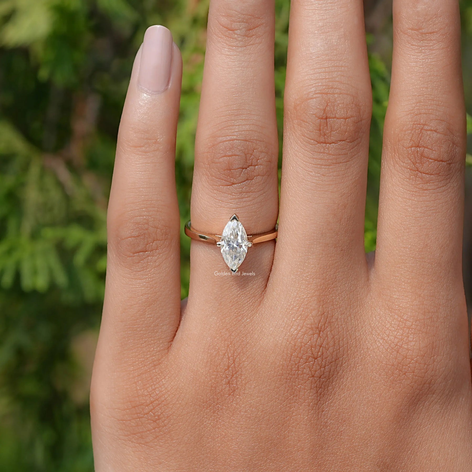 Top View Of Marquise Cut Moissanite Solitaire Ring in prongs setting