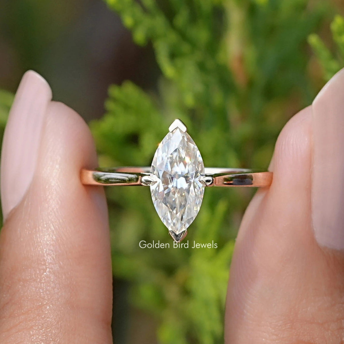 Front view of Off White Marquise Cut Moissanite Solitaire Ring
