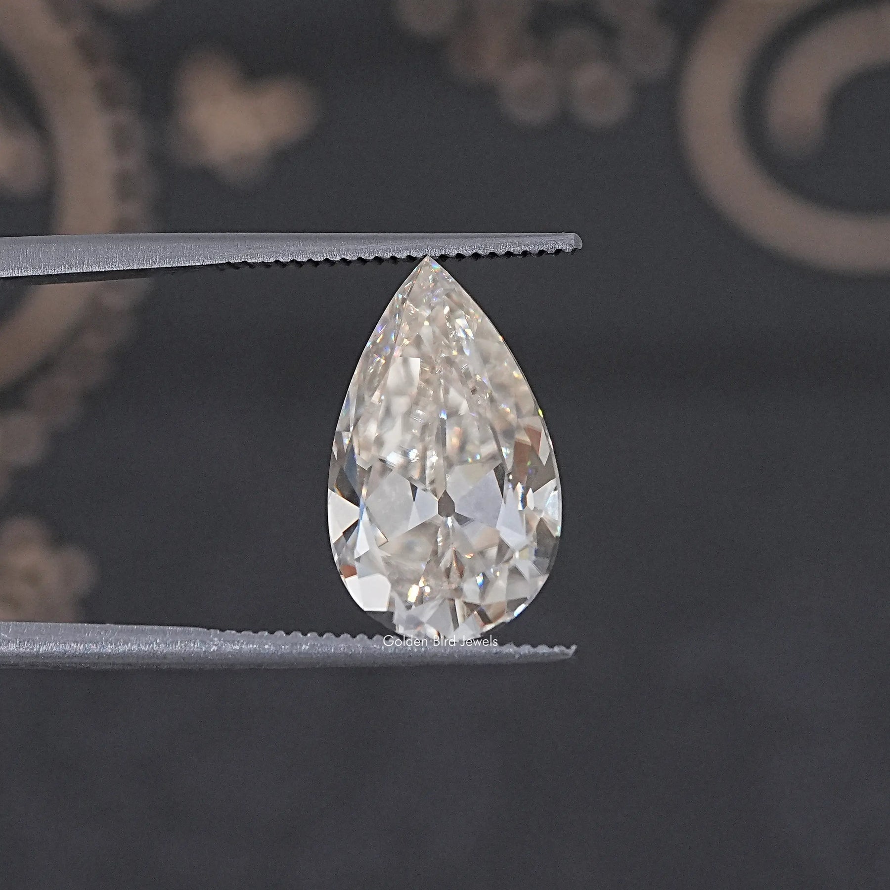 Off White Old Mine Pear Loose Moissanite