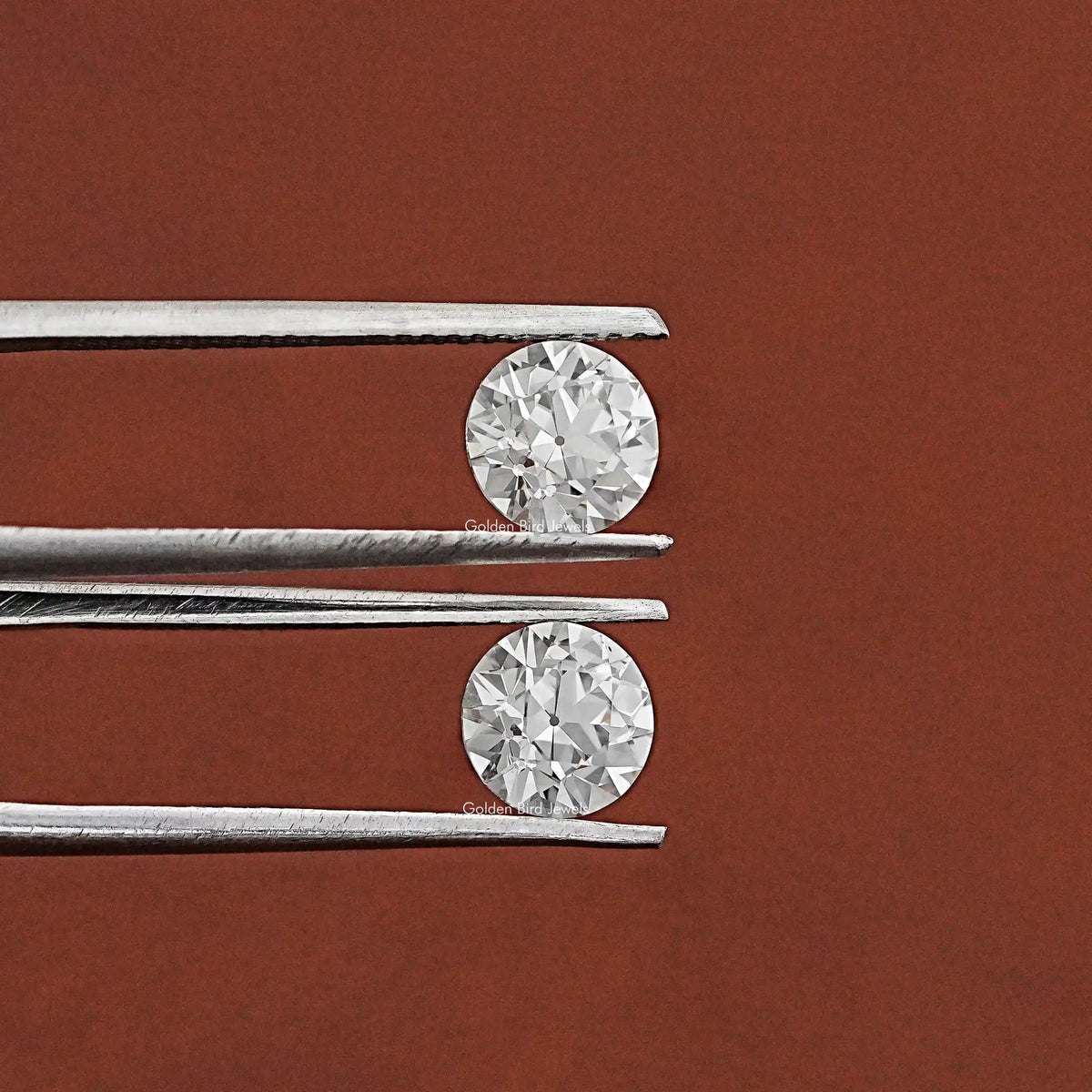 Tweezer hold on Old European Round Cut Diamond