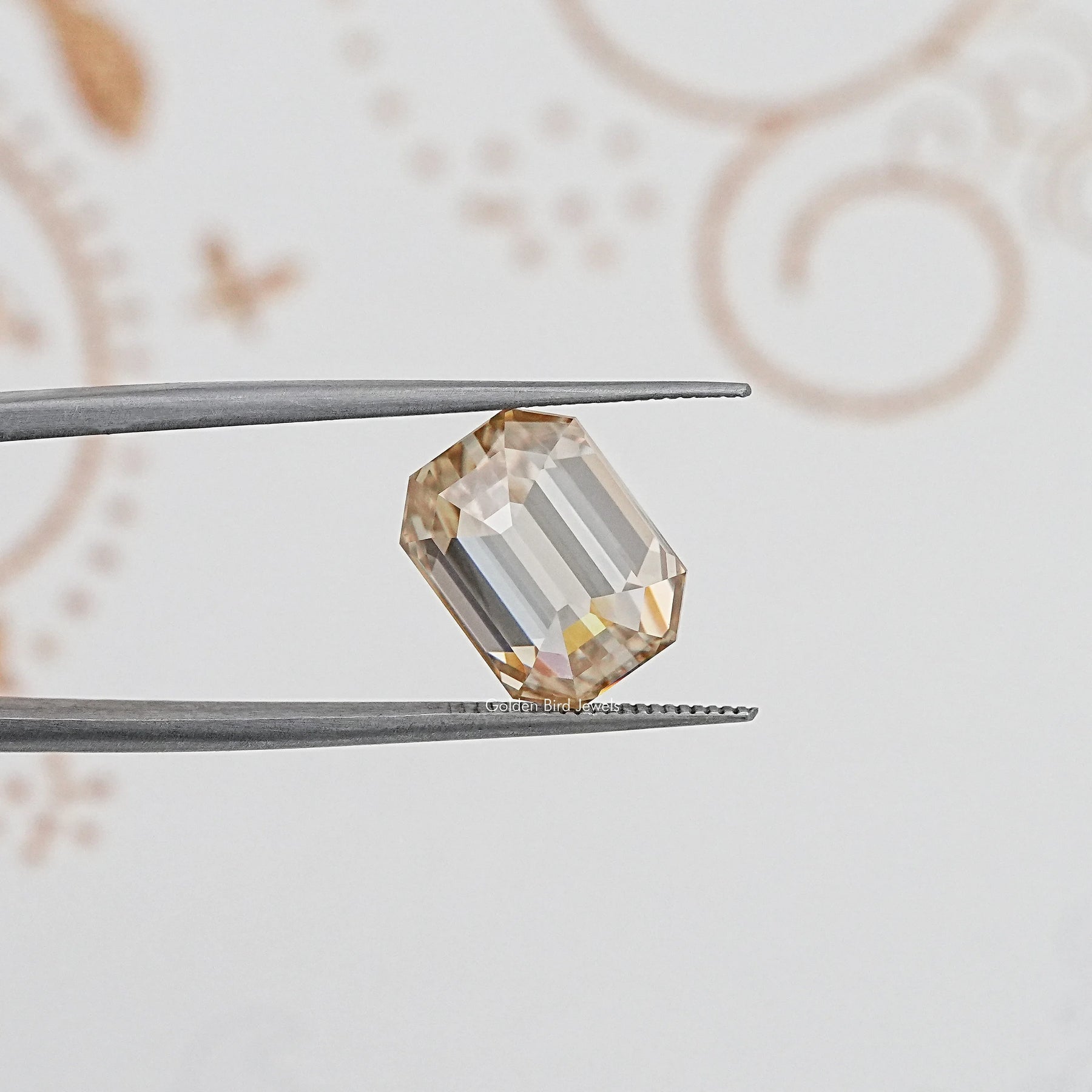 In Tweezer View Of Old Mine Emerald Cut Loose Moissanite Stone