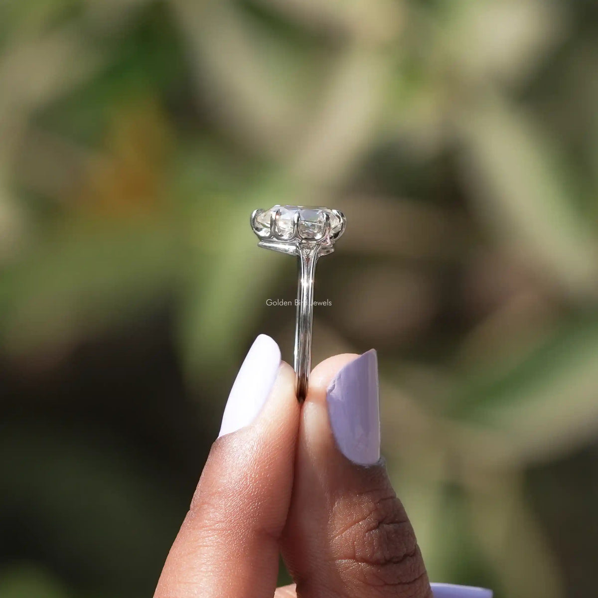 Side View of Engagement ring crafted in old mine pear cut diamond