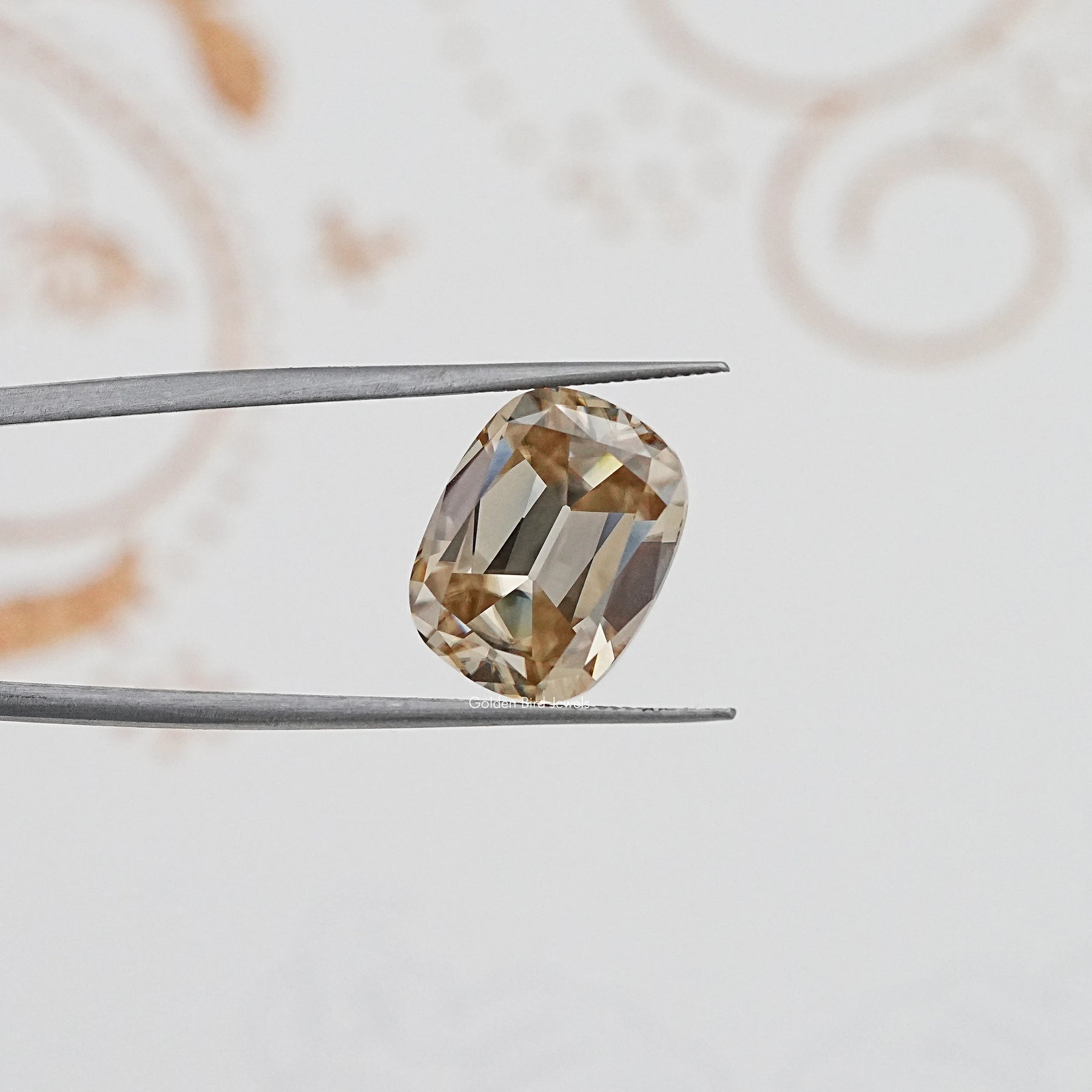 In Tweezer View Of Old Mine Cushion Cut Loose Moissanite Stone