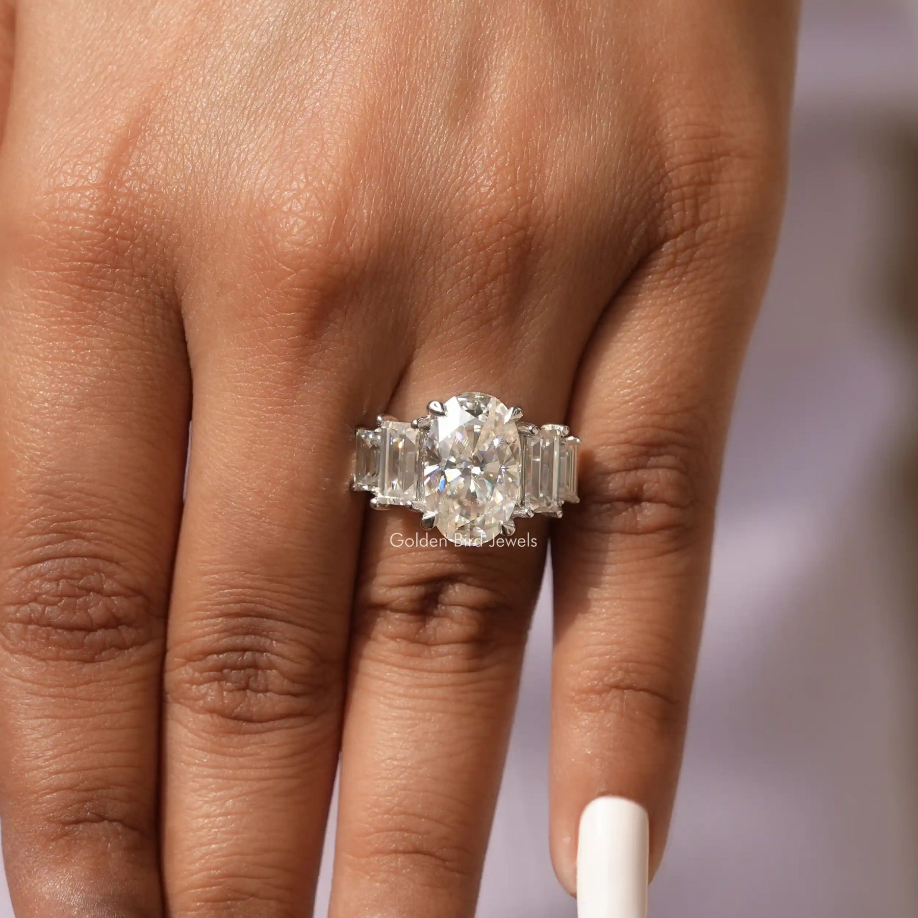 View of Moissanite Oval Cut Five Stone Ring In White Gold