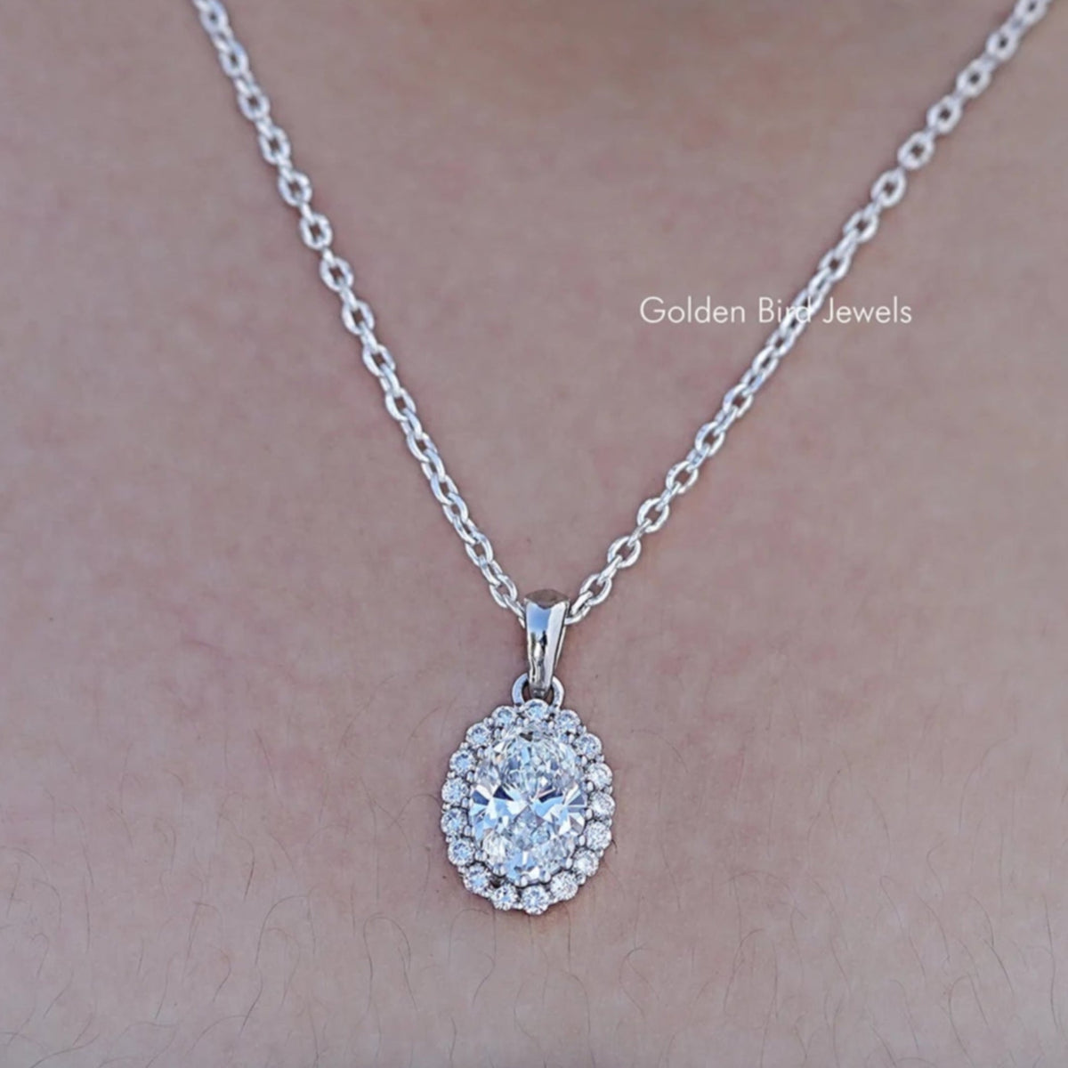 Close up view of Oval Lab Diamond Halo Pendant In White Gold
