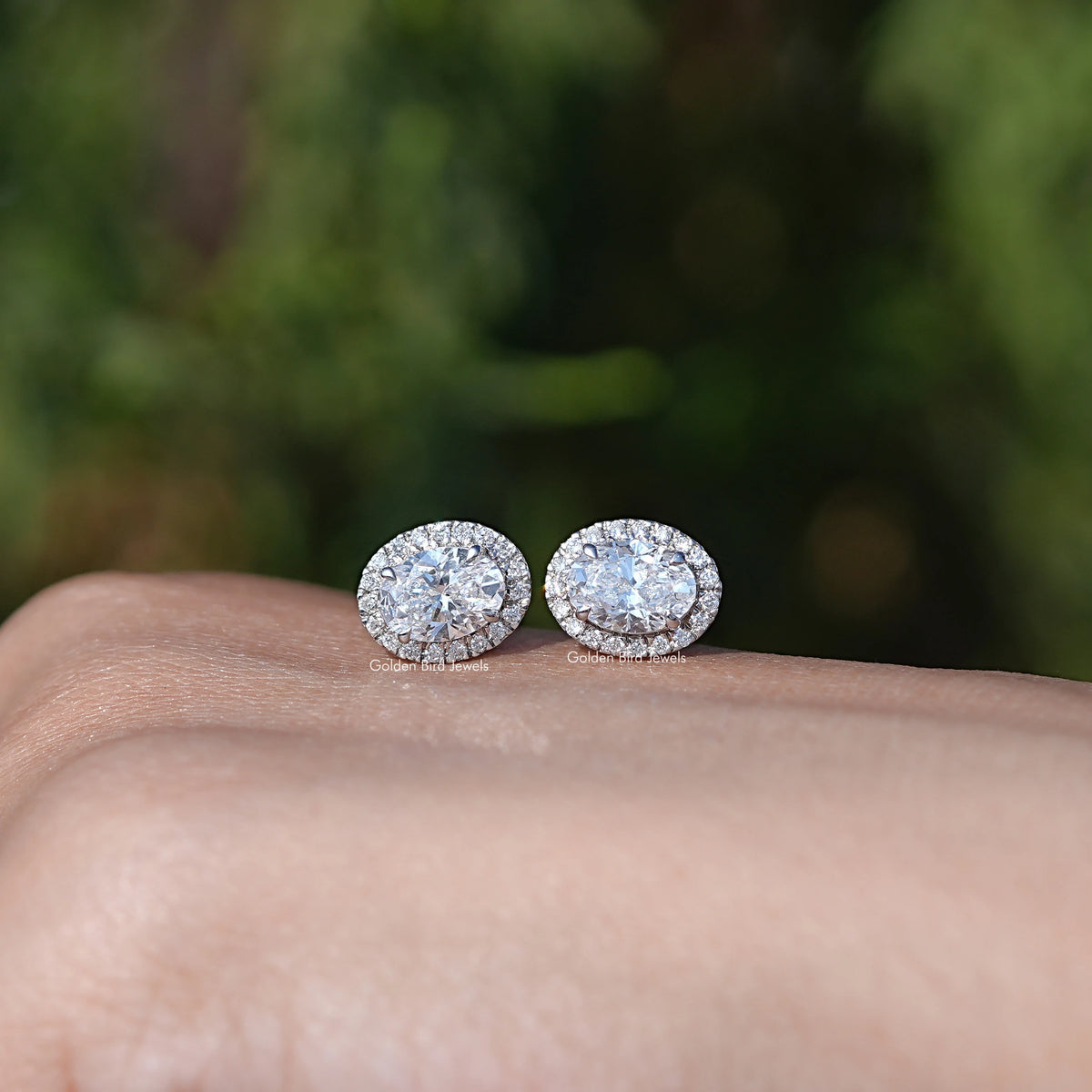 Hand View Of Round Cut Lab Diamond Stud Earring In Women's