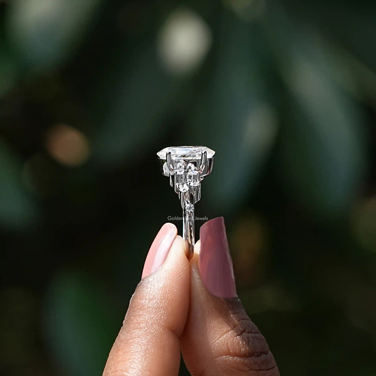 side view of a solitaire oval cut moissanite ring for women